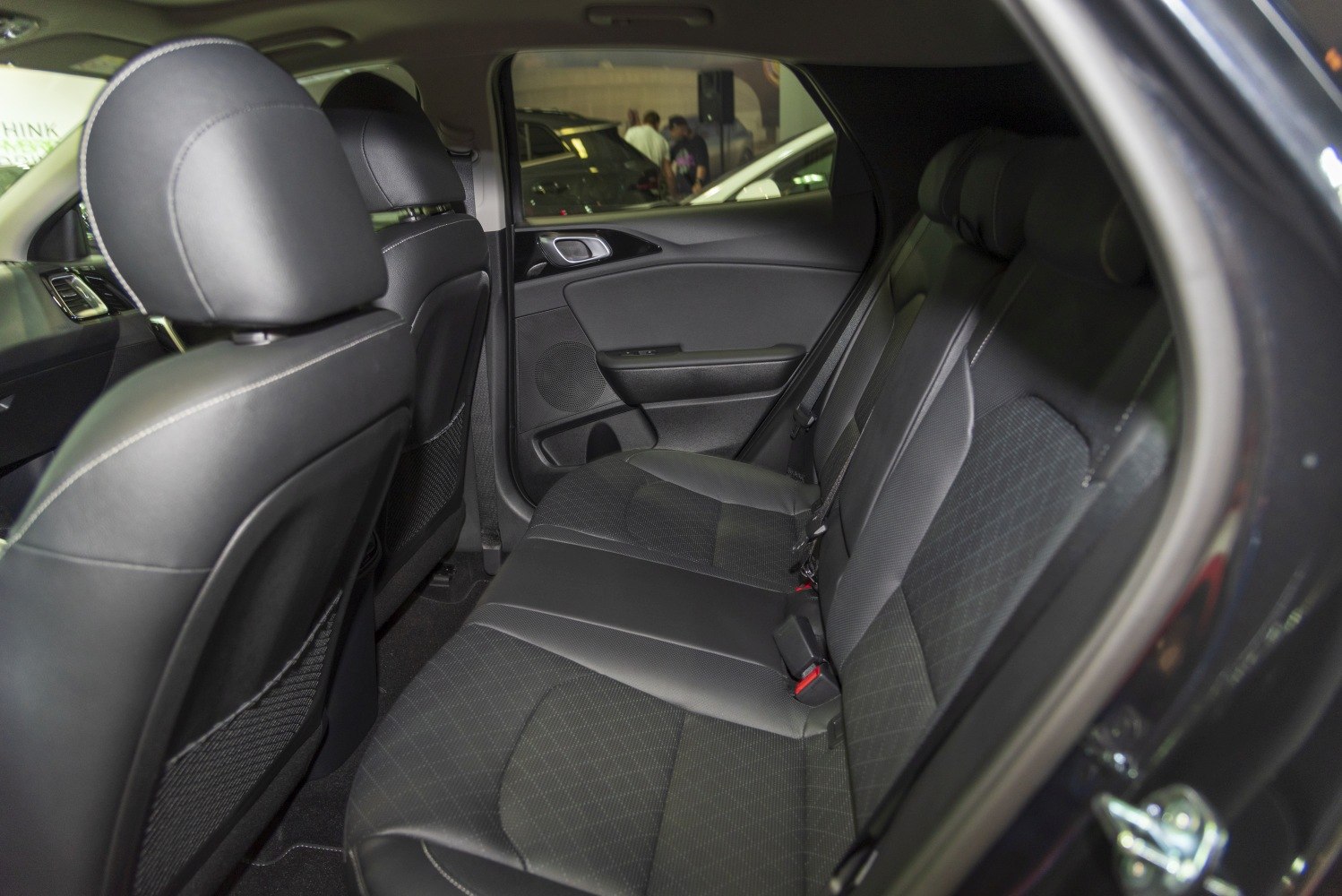 Black leather rear seat with modern door panel