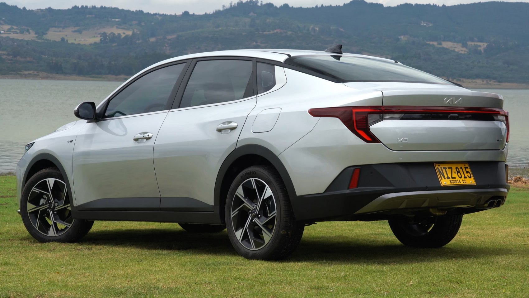 Rear and side view of sedan with LED taillights and alloy wheels