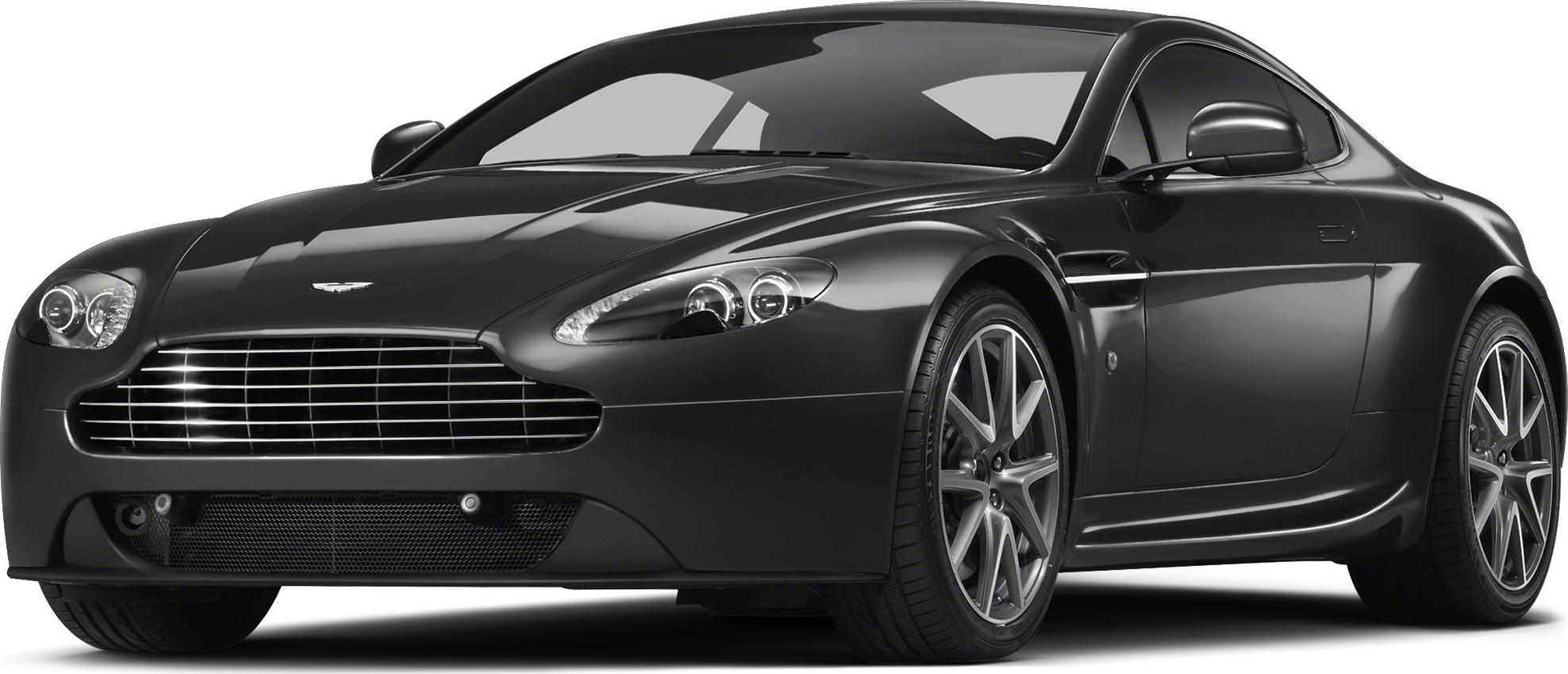 Front view with prominent grille and headlights of a luxury sports coupe