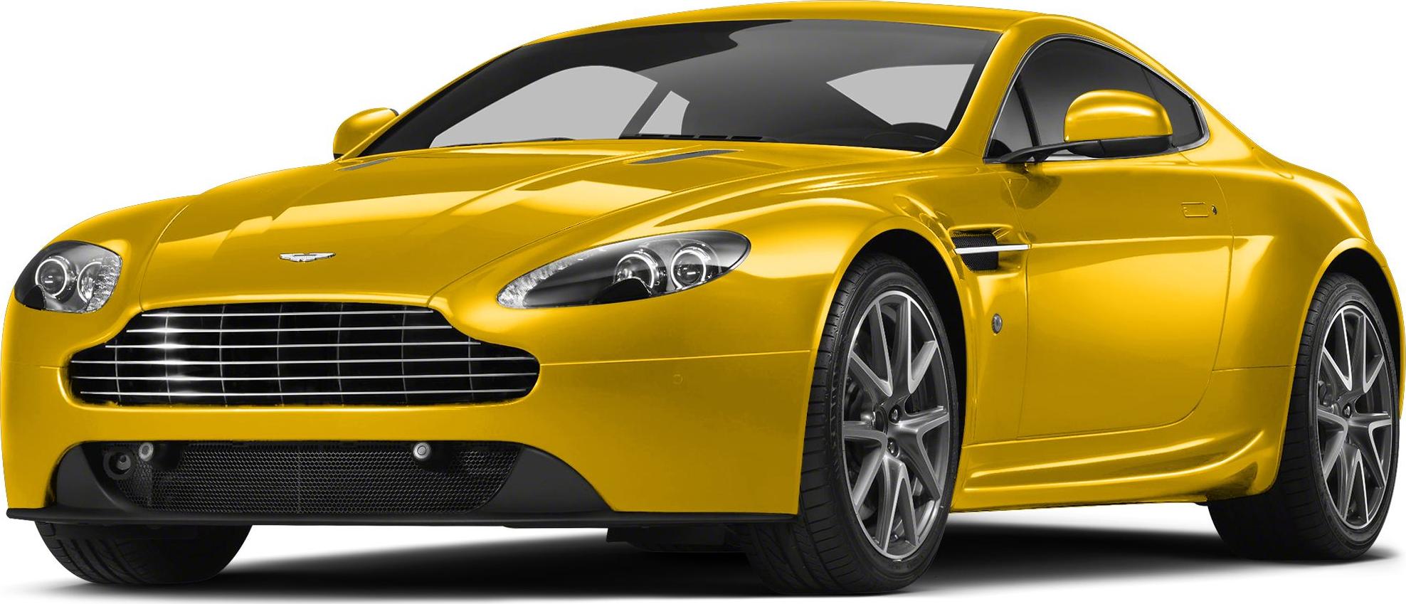 Front view of yellow sports coupe with distinctive grille and headlights
