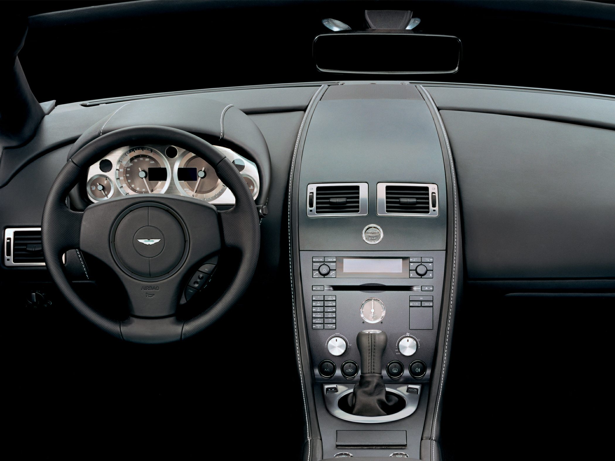 Steering wheel and central control panel with gear shifter