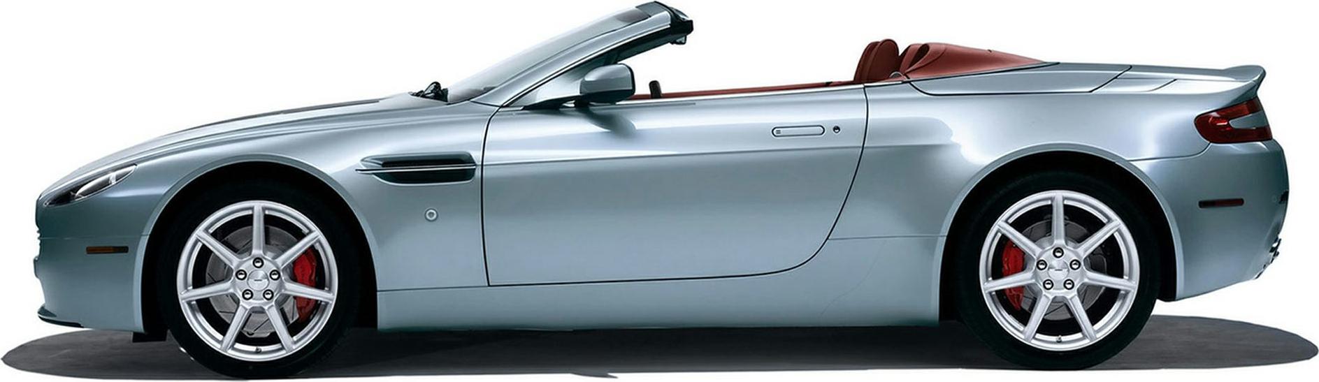 Silver convertible with red interior, sporty alloy wheels, side profile