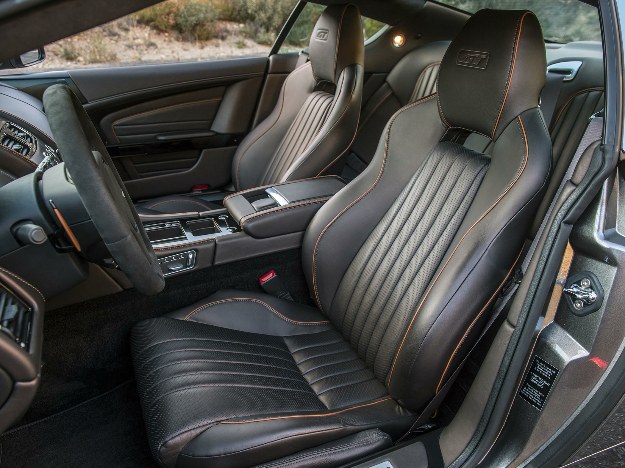 Black leather GT embossed sports seats with orange stitching