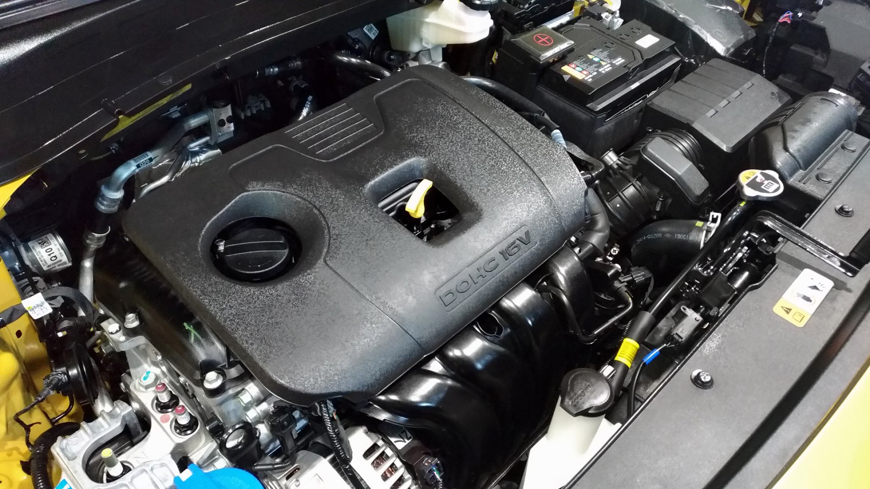 Close-up of engine bay with DOLHC 16V cover and components