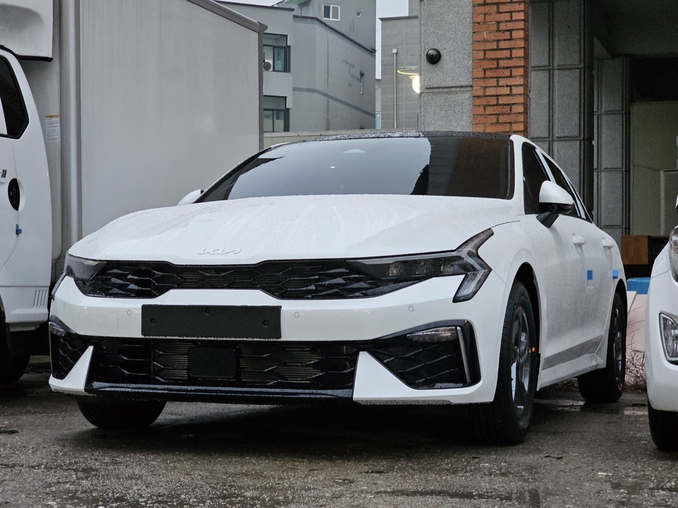 Sharp front grille and sleek headlights with bold modern design