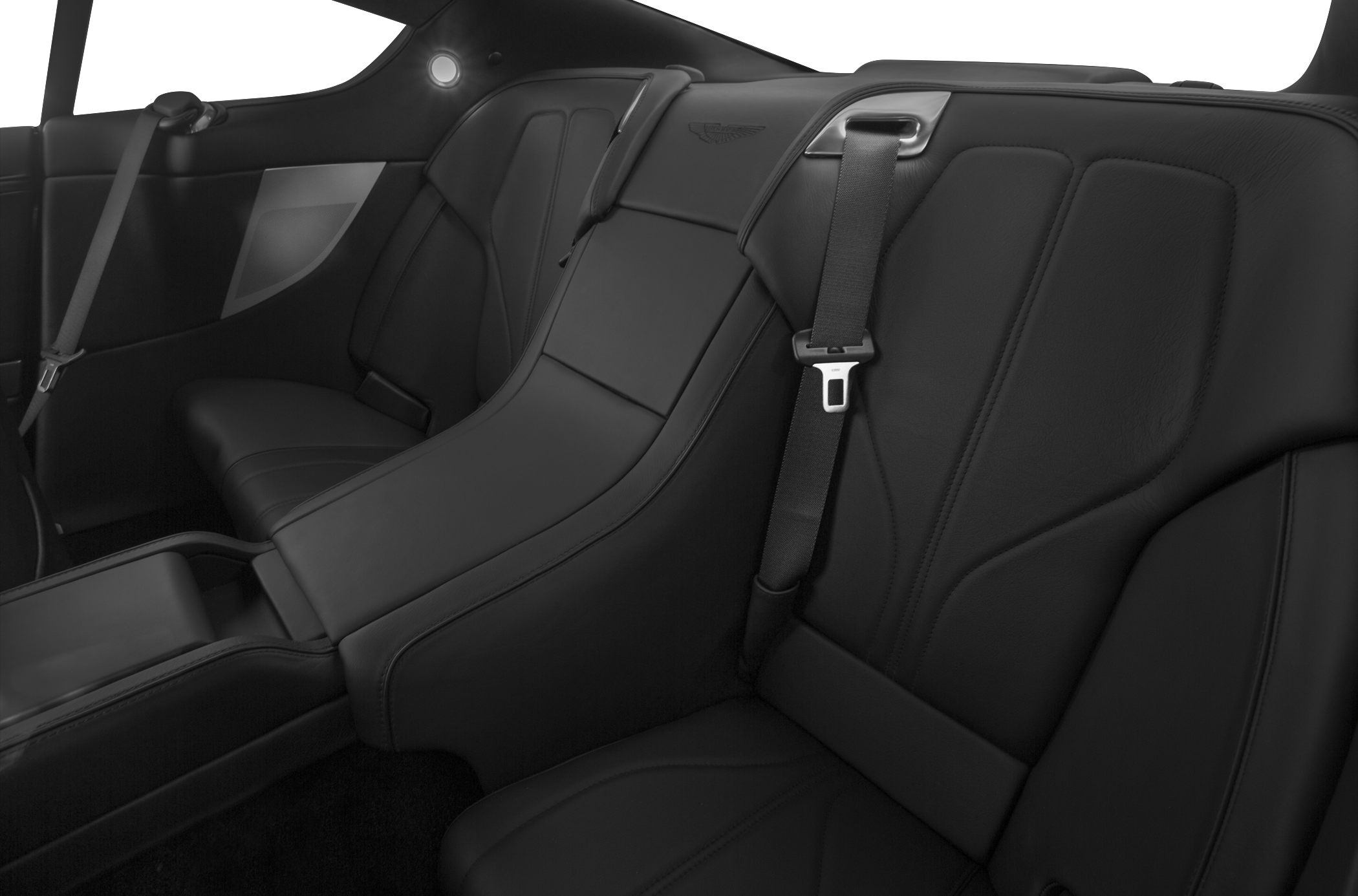 Black leather rear seats with seat belts and intricate stitching