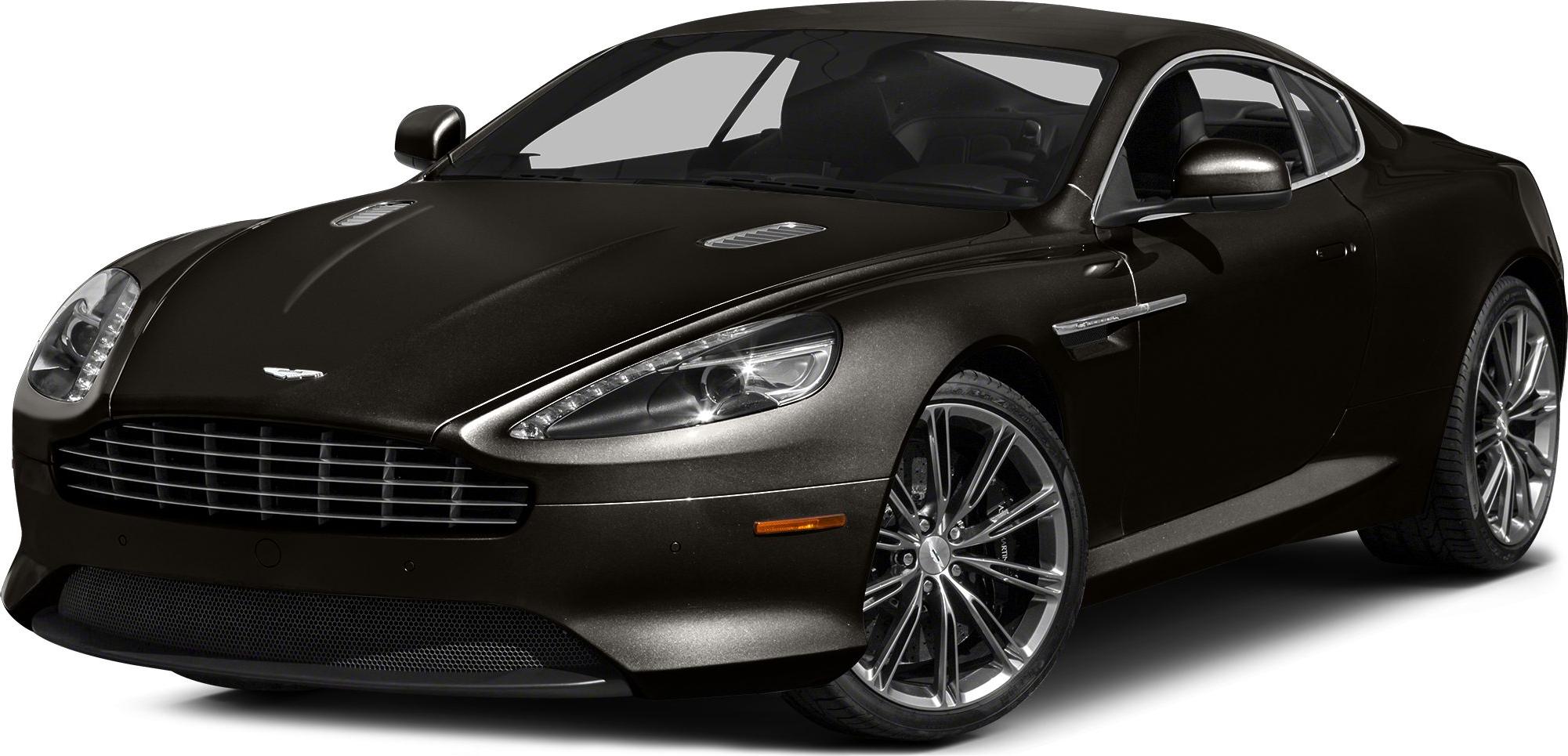 LED headlights and multi-spoke alloy wheels on a luxury coupe front view.