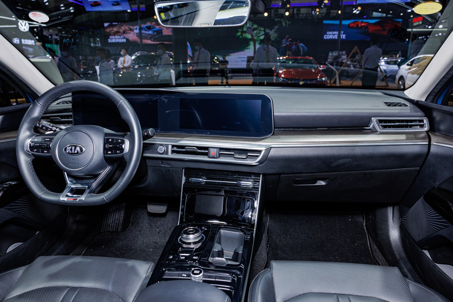 Interior dashboard with large infotainment screen and multifunction steering wheel