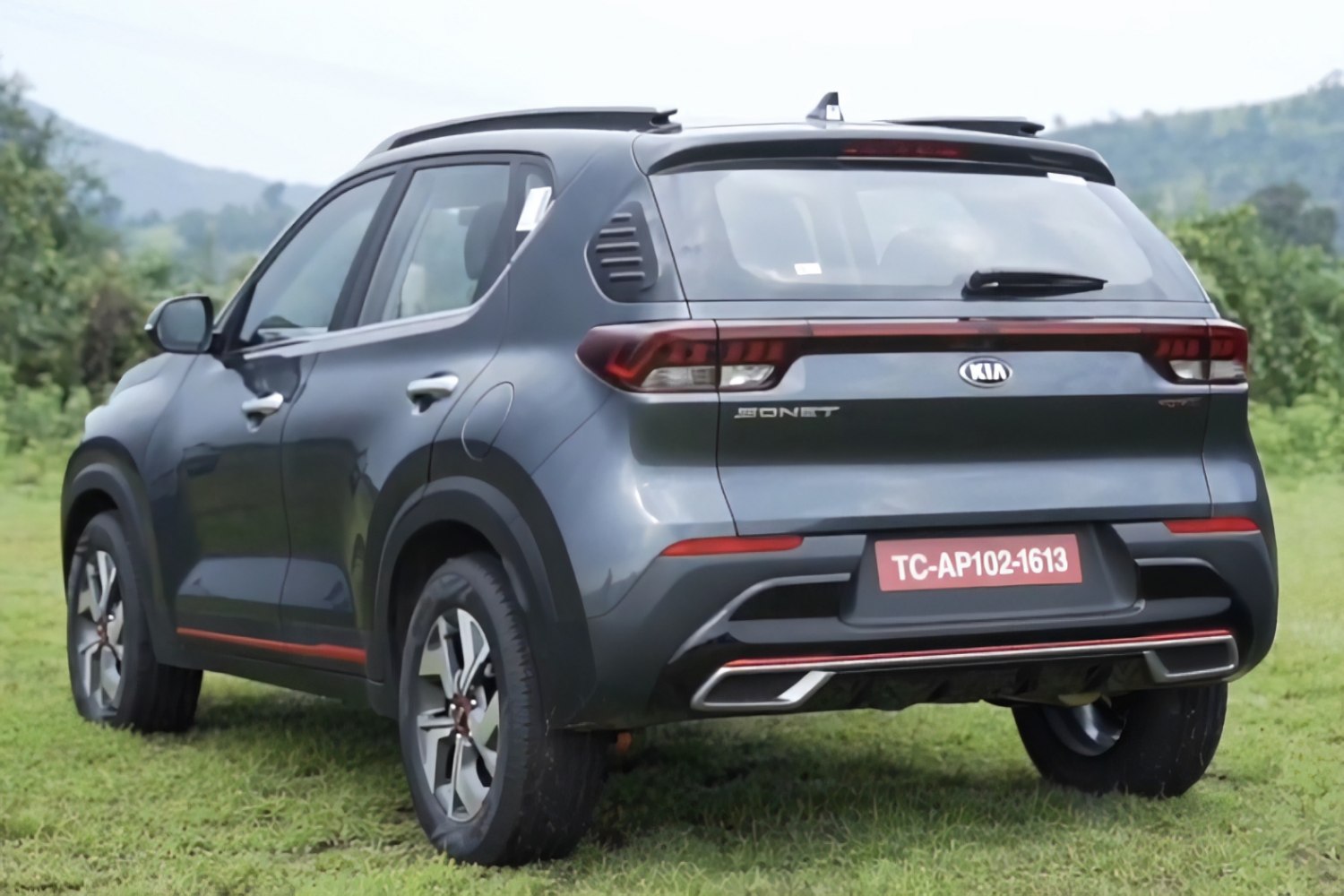 Compact SUV rear with distinctive tail lights and dual exhaust