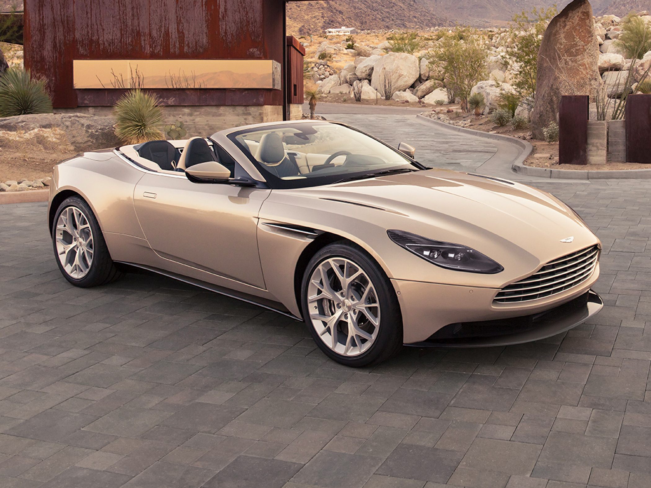 Convertible luxury sports car front side view with sleek design and alloy wheels