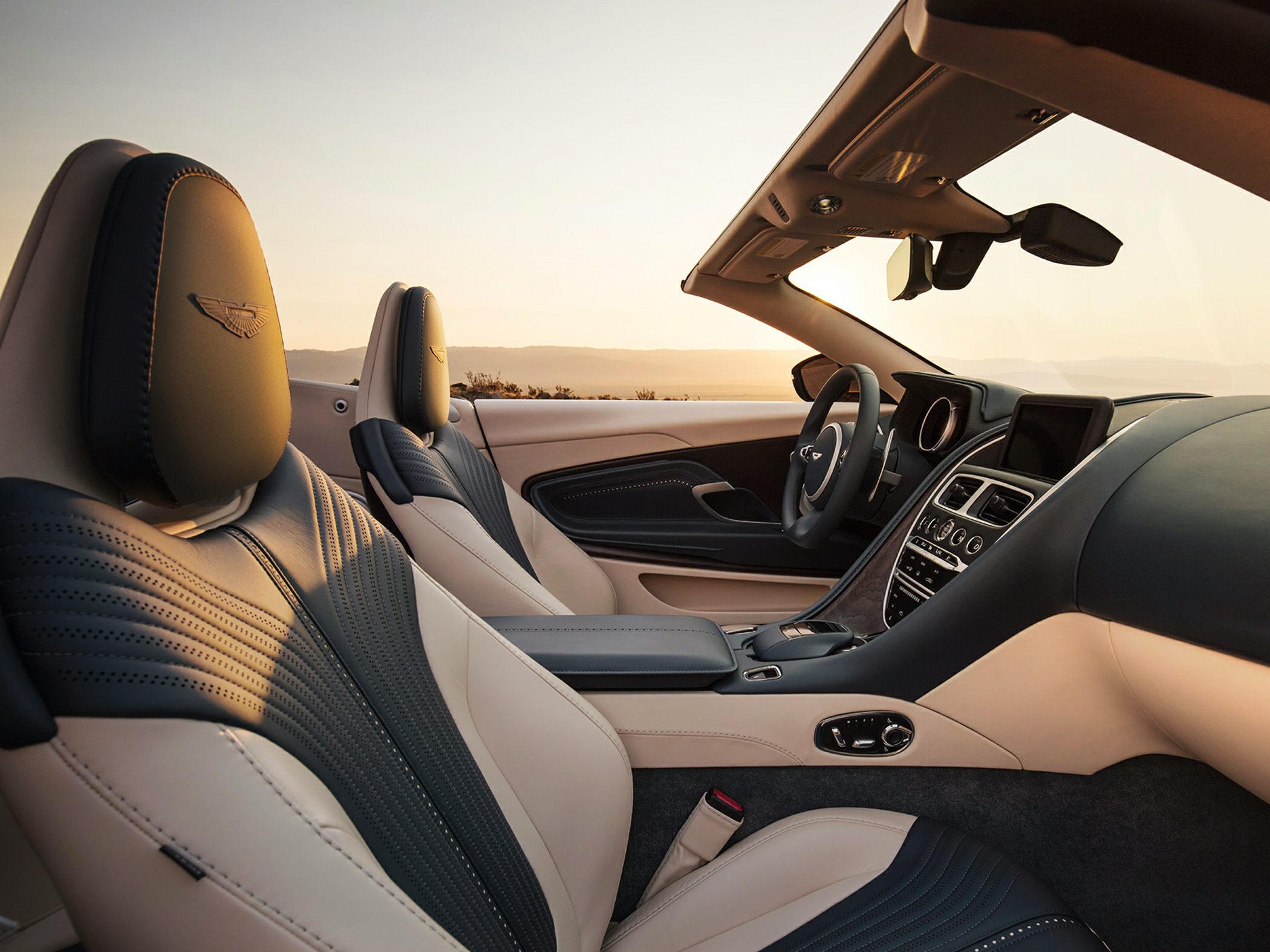 Luxury convertible interior with premium leather seats and advanced dashboard