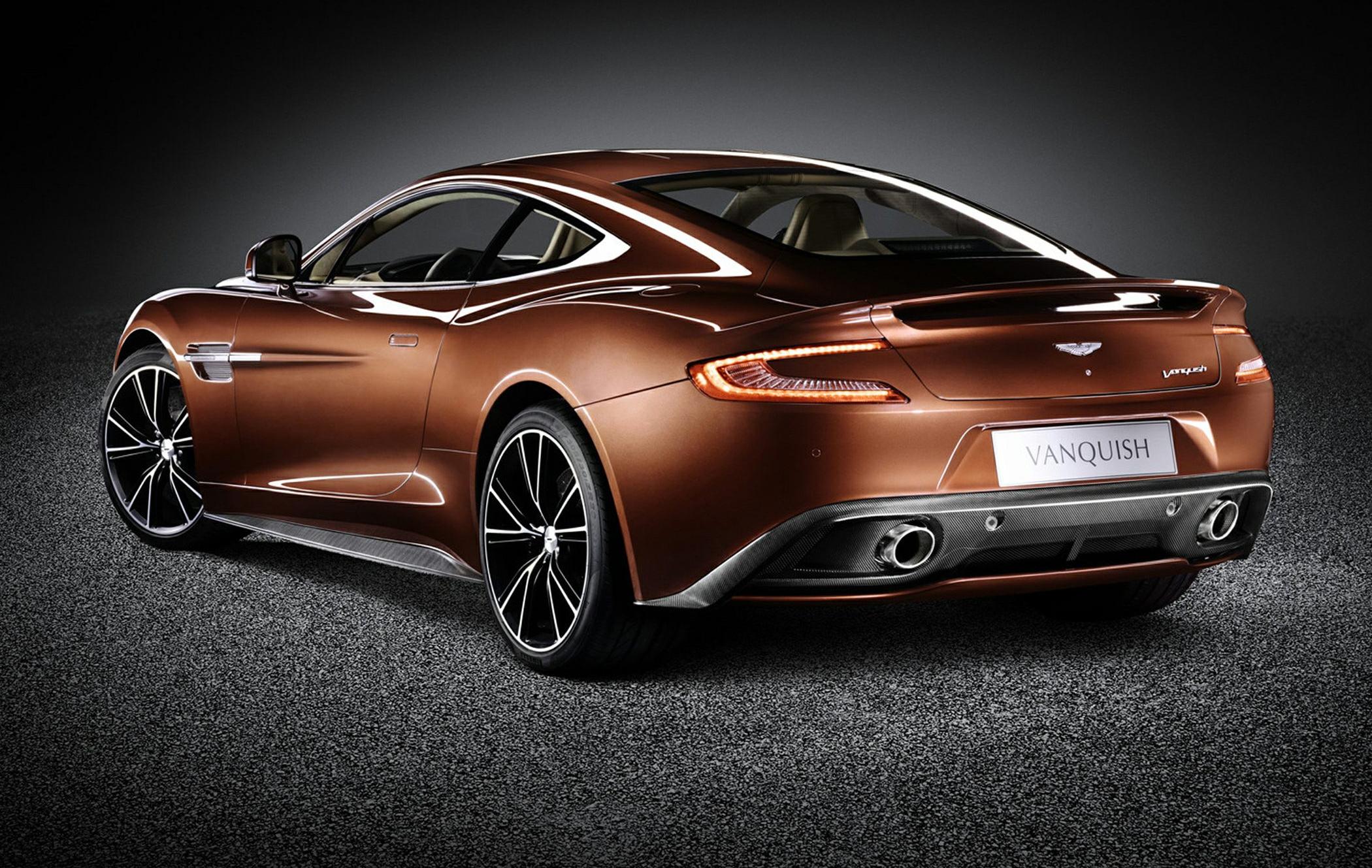 Luxury coupe rear side with sleek aerodynamic lines and dual exhausts