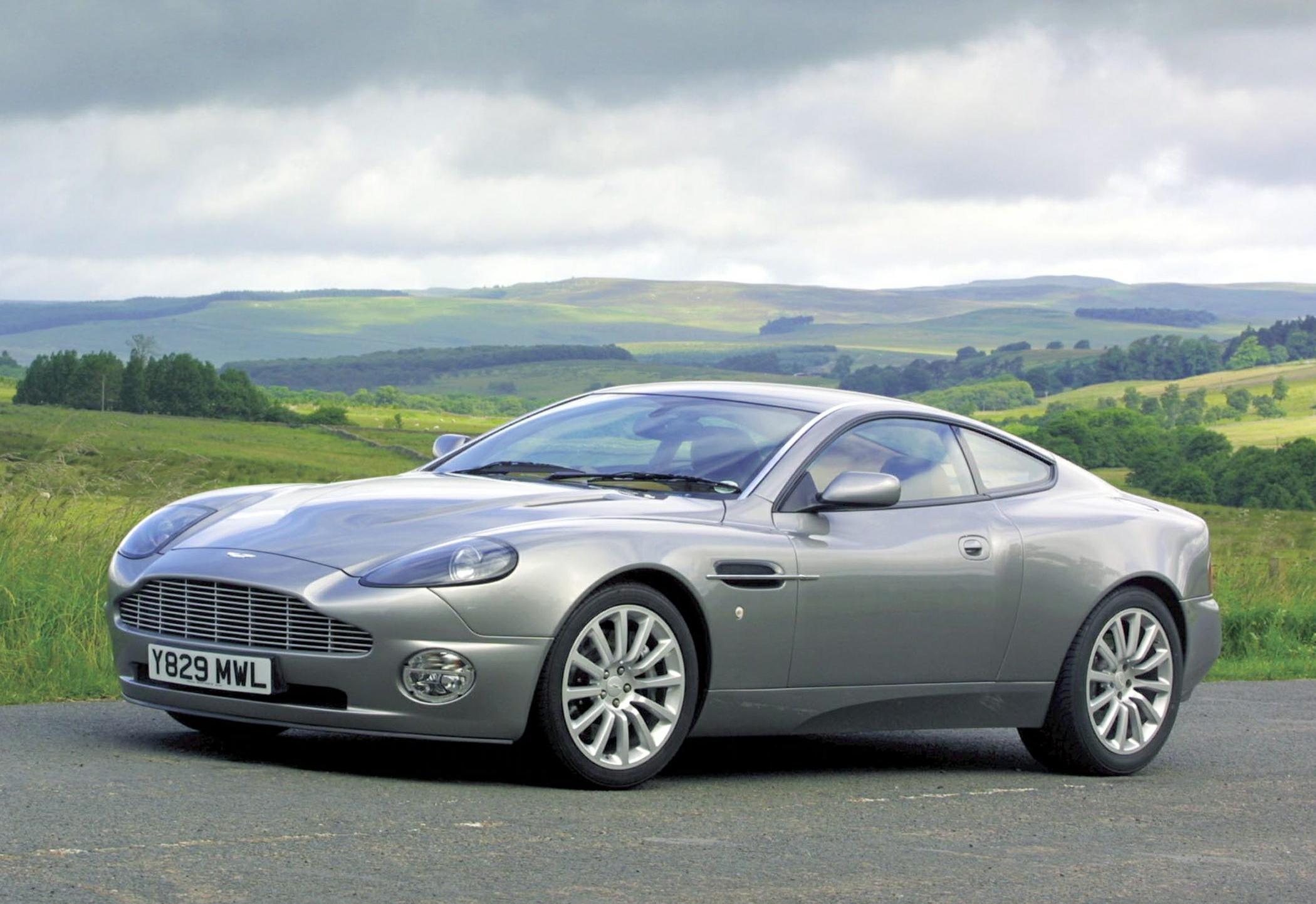 Silver sports coupe with iconic front grille and alloy wheels