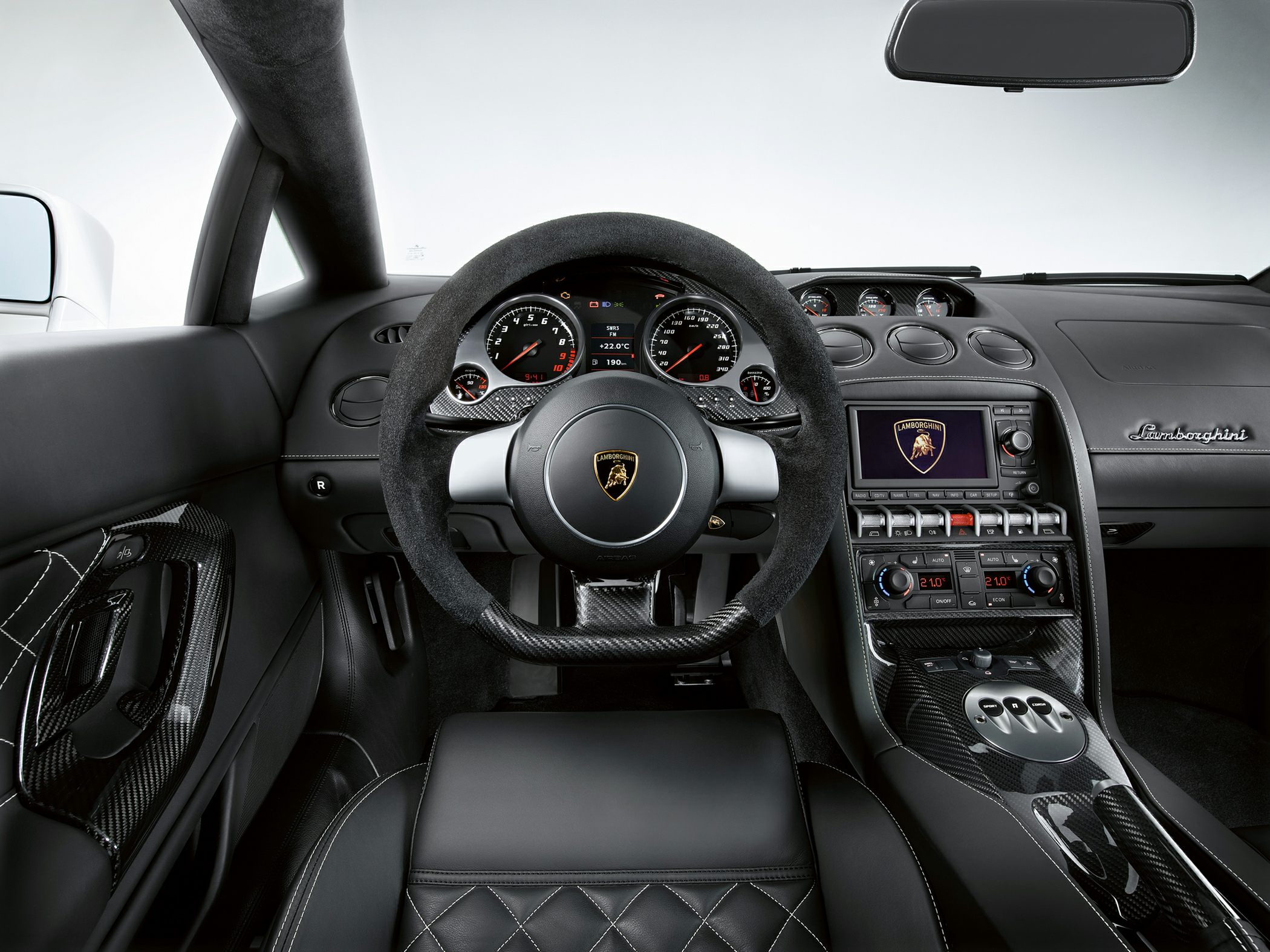 Steering wheel, instrument cluster, carbon fiber center console