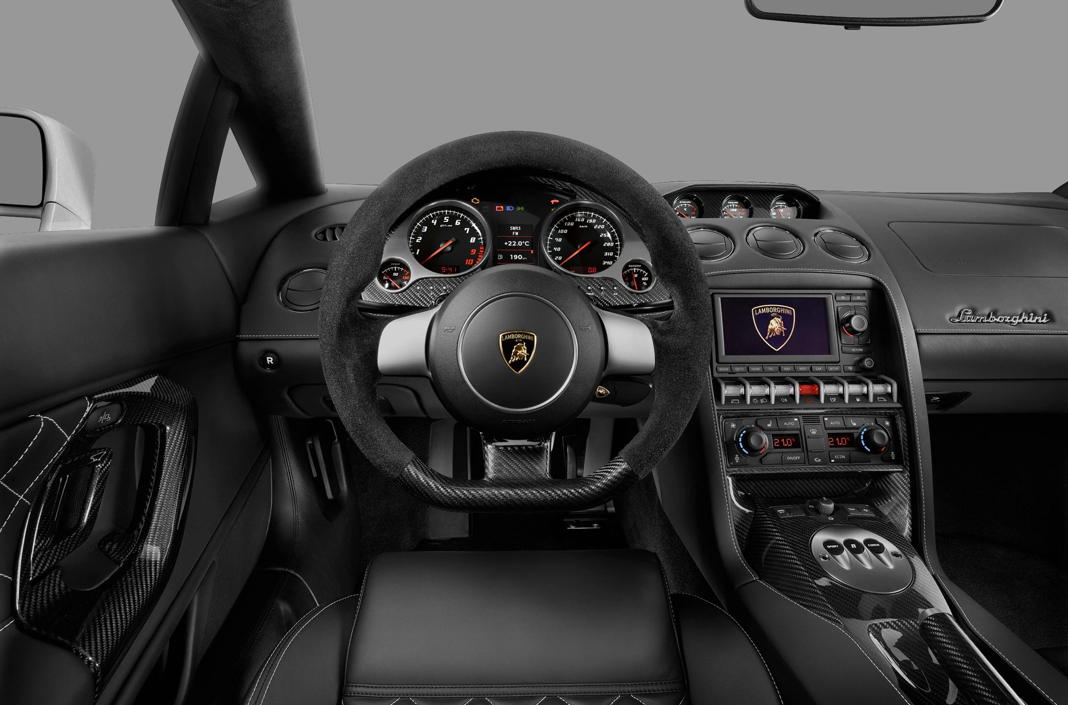 Suede steering wheel, carbon fiber dashboard and center console
