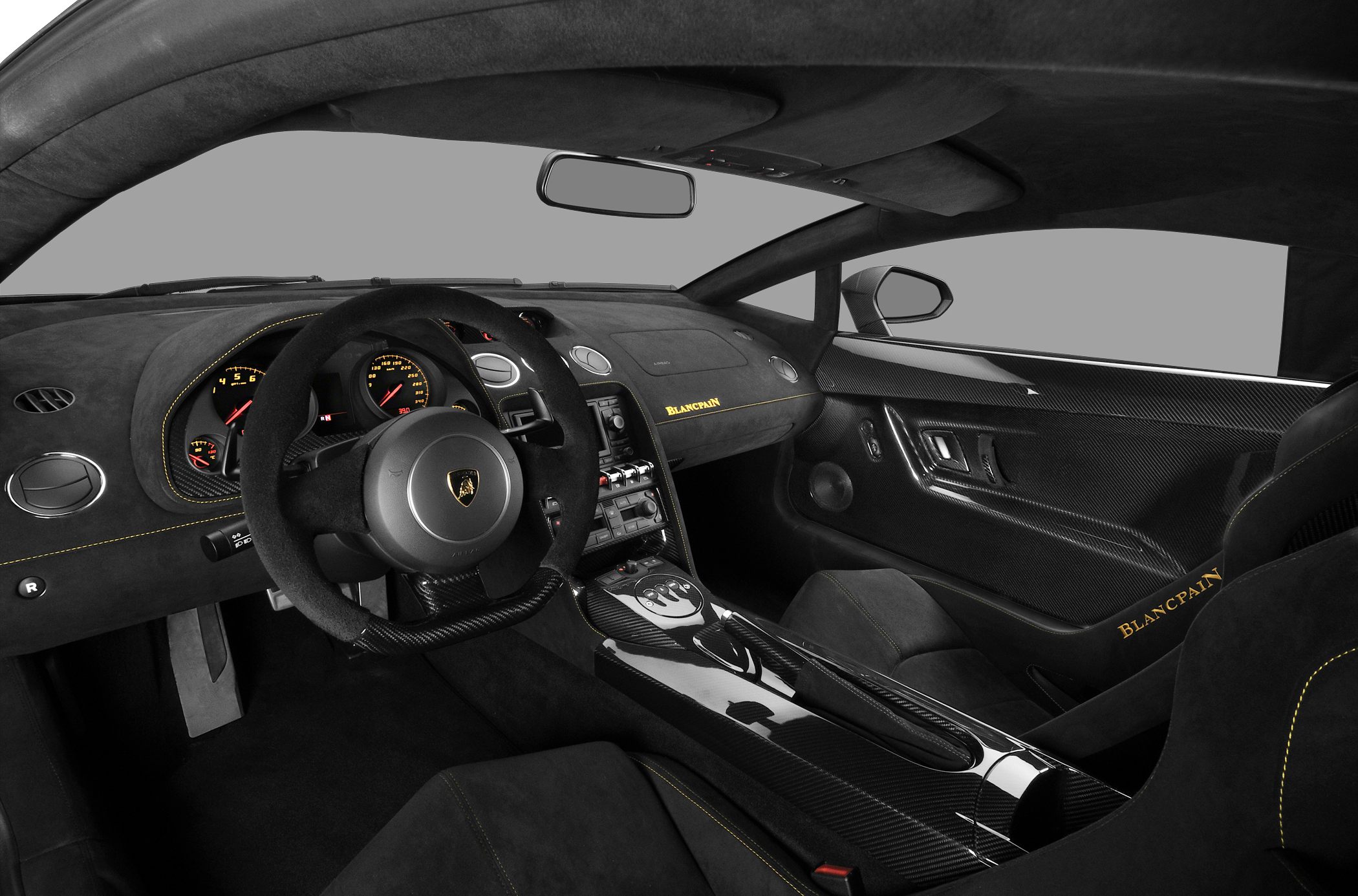 Carbon fiber interior trim and Alcantara upholstery with Blancpain branding.