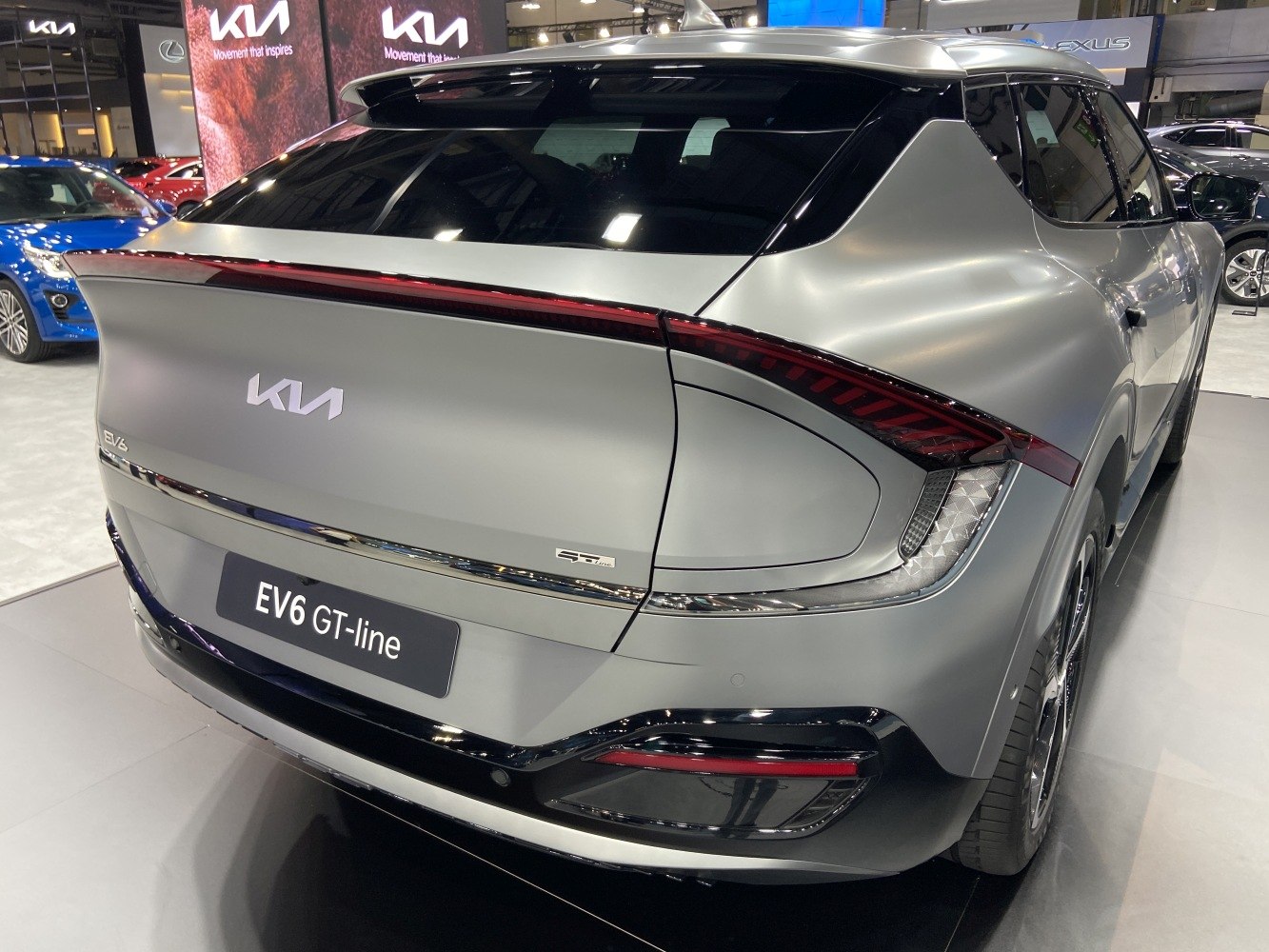 Rear view of a modern electric SUV with distinctive tail light and spoiler design