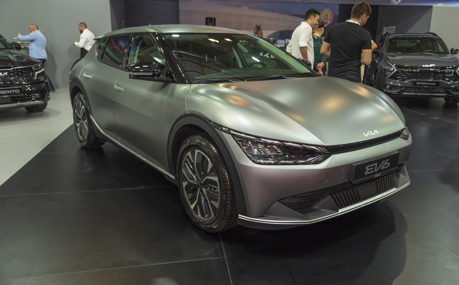 Front side view of electric SUV with sleek aerodynamic design and LED headlights