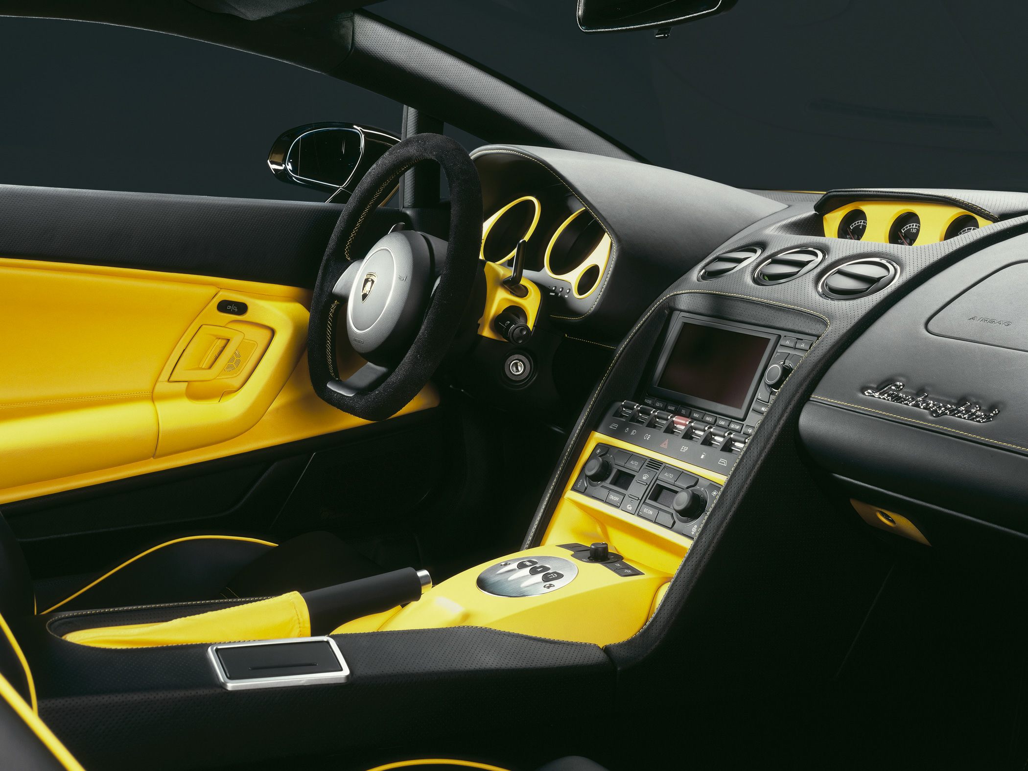 Luxury sports car interior with dashboard, steering wheel, center console