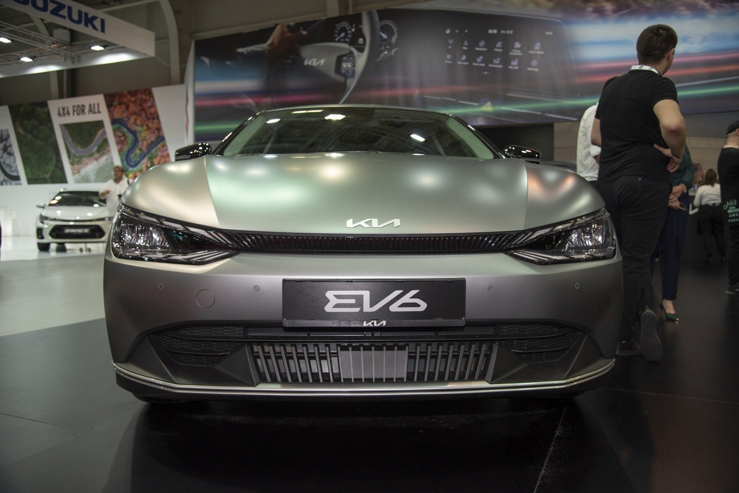 Front view with sleek LED headlights and modern grille design