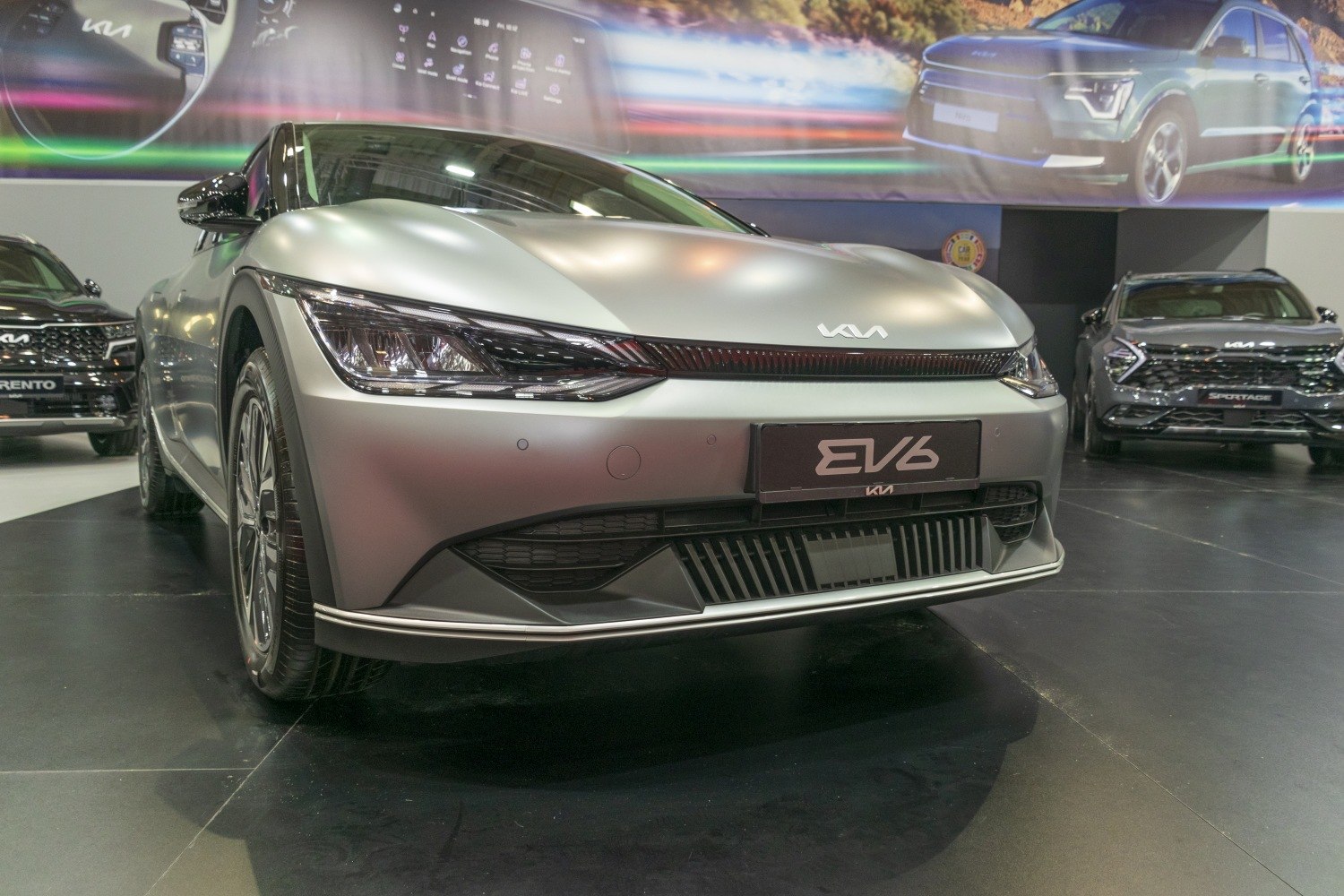 Futuristic front fascia with sharp LED headlights and aerodynamic styling.