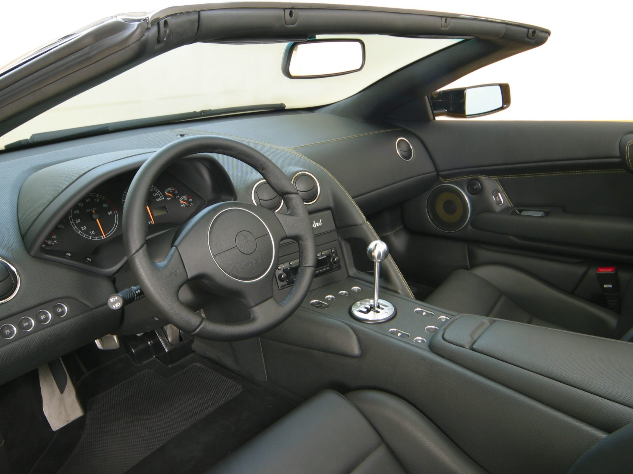 Interior with manual gated gearstick and leather upholstery