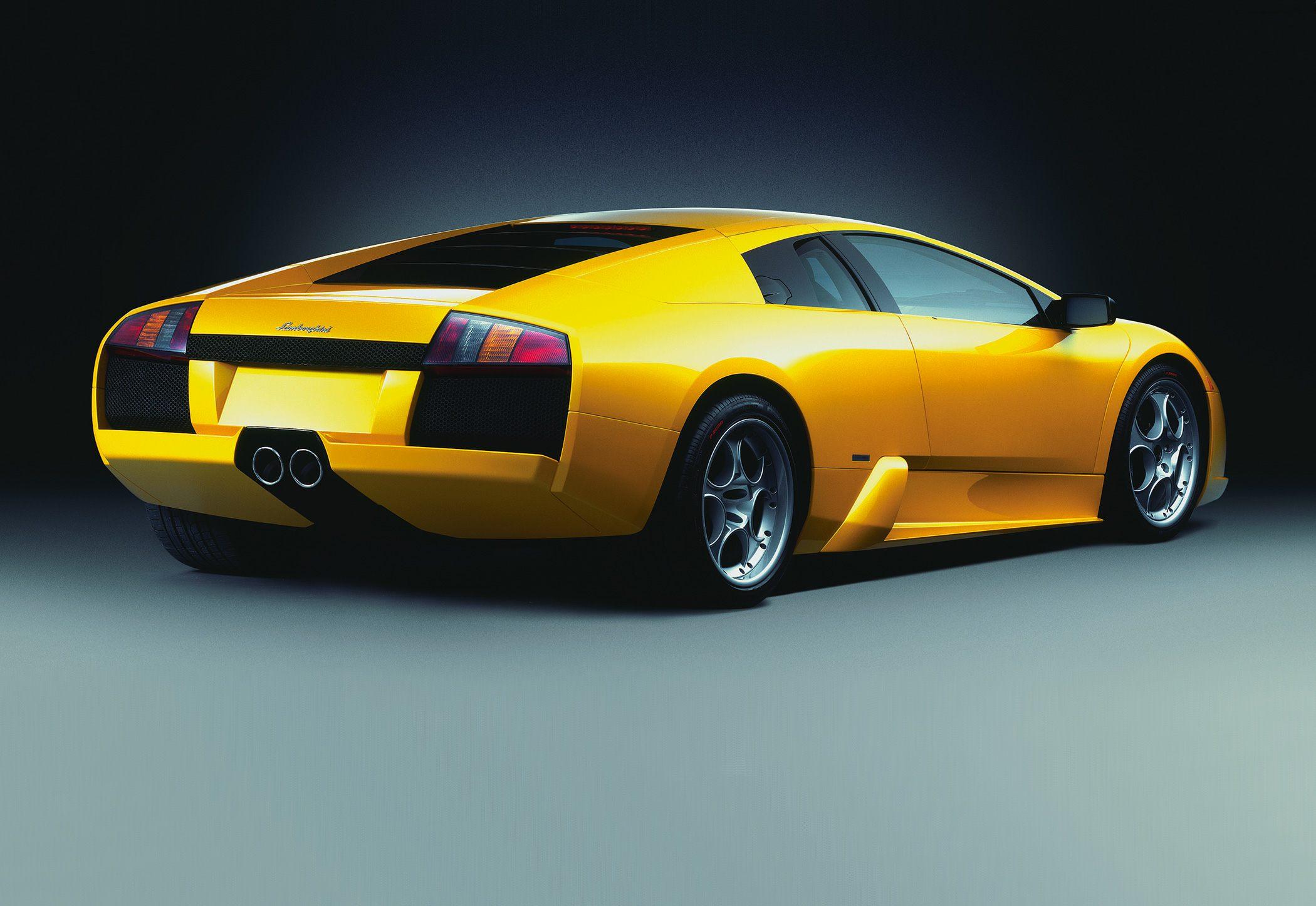 Rear view with dual exhausts and alloy wheels