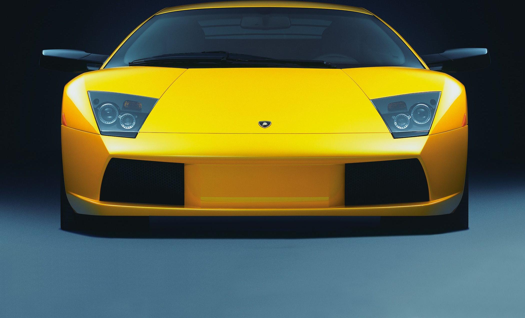 Front view with iconic headlights and bold aerodynamic front fascia