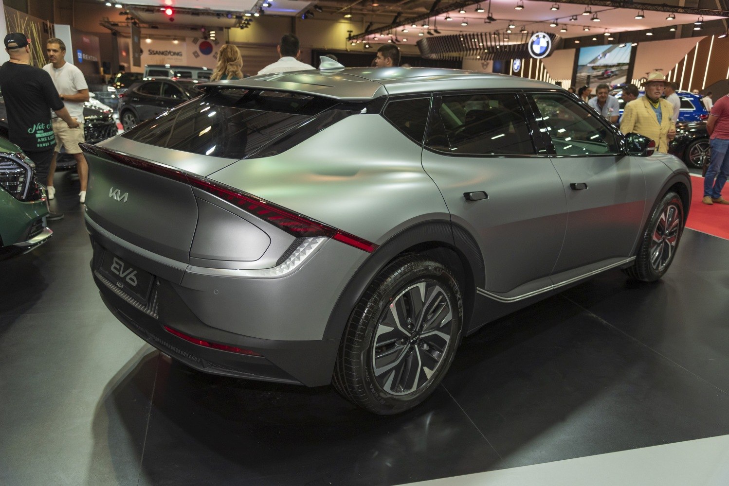 Sleek rear and side electric vehicle design with aerodynamic features and stylish wheels.