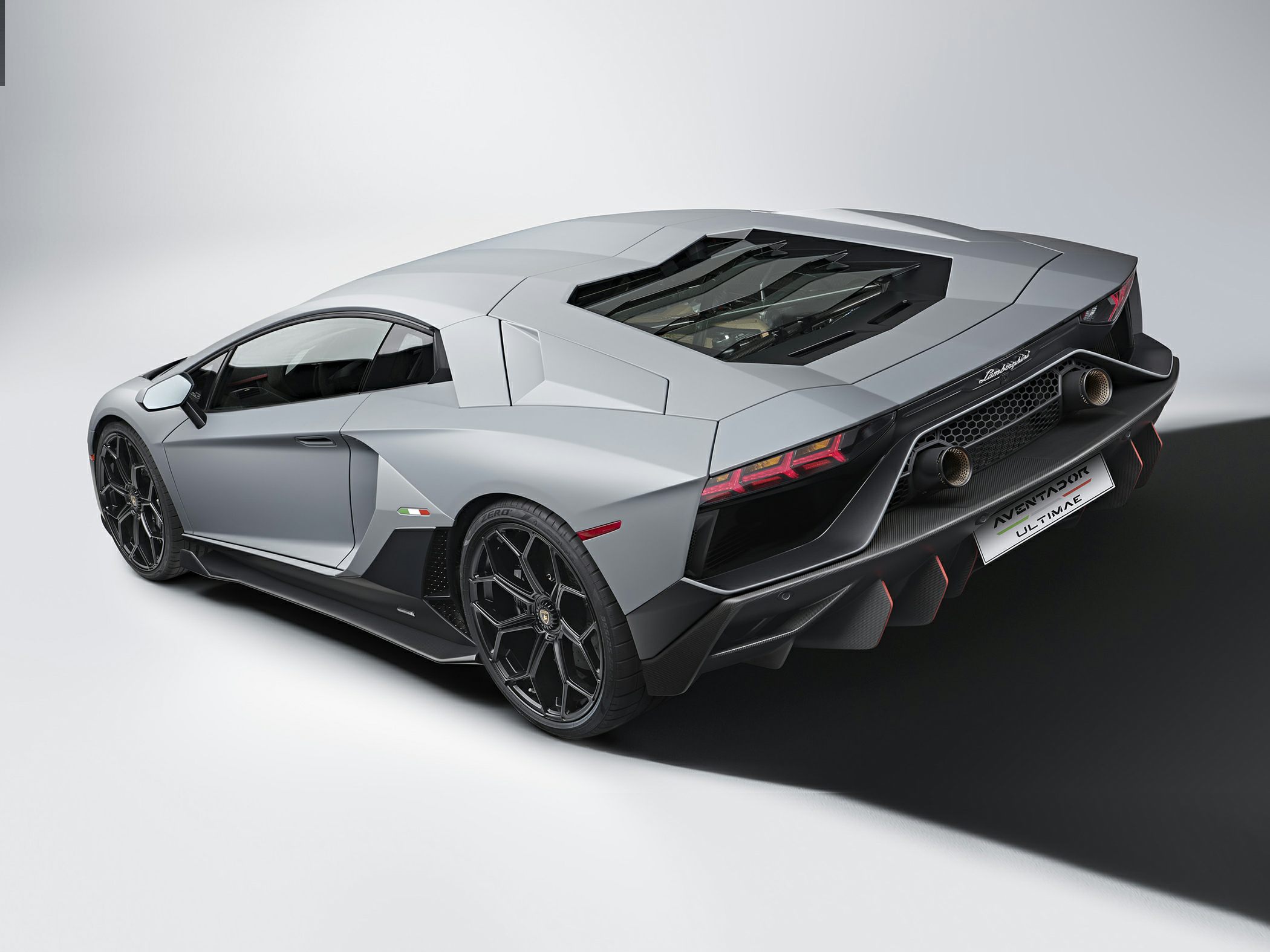 Angular rear view with hexagonal wheels and dual exhaust pipes