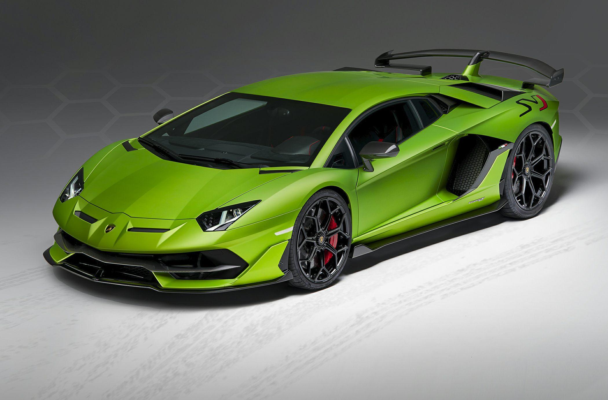 Bright green sports car with large rear wing and aerodynamic design