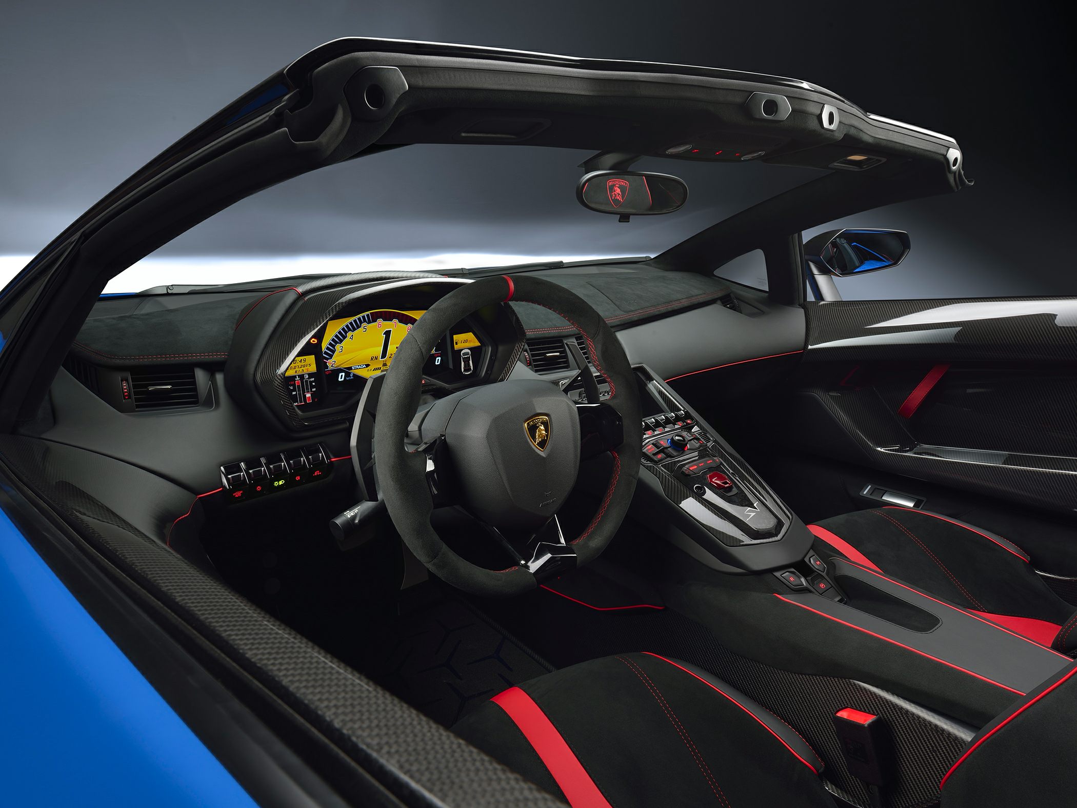 Luxury convertible interior with digital dash and carbon fiber trim