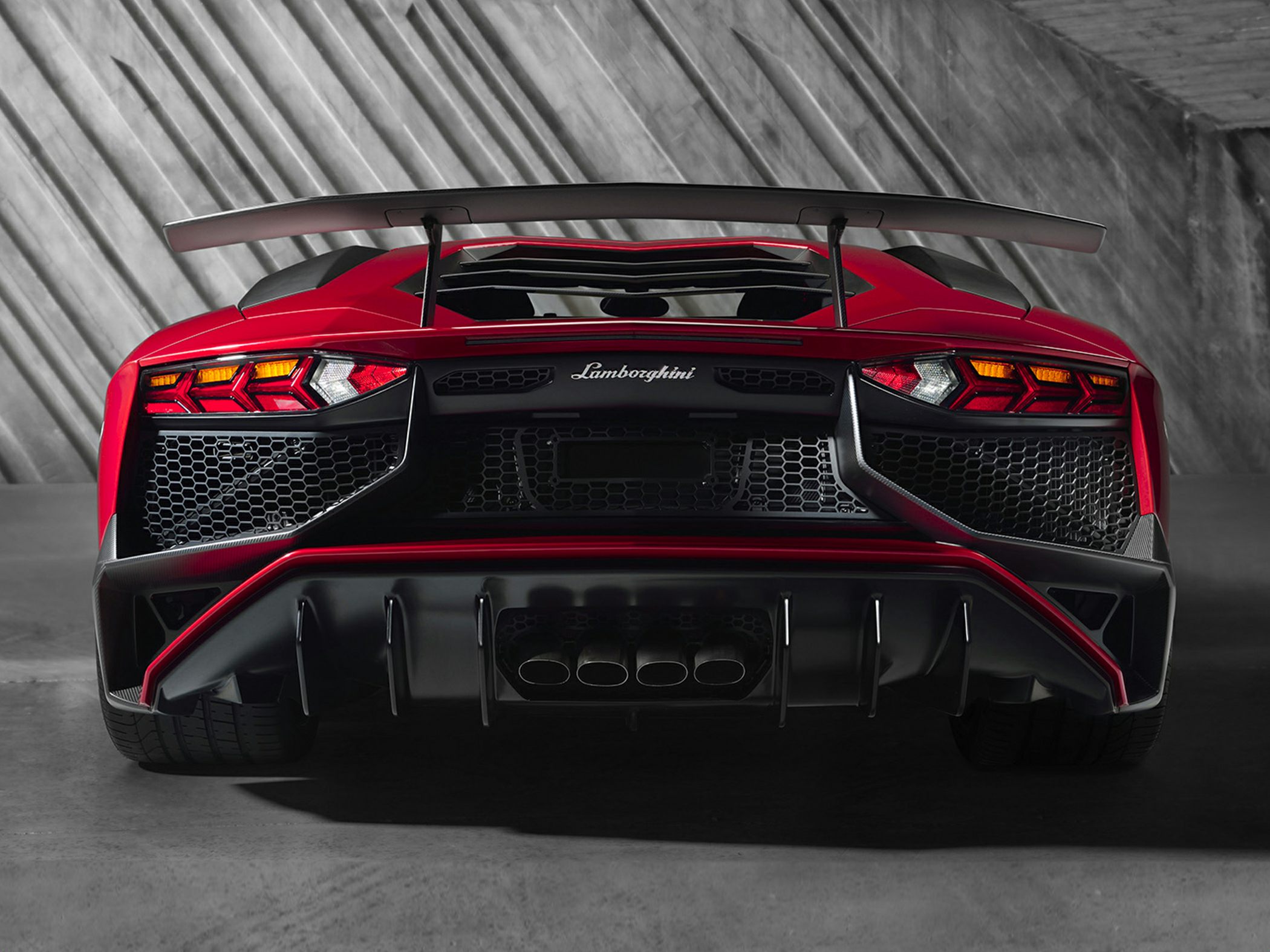 Rear view with quad exhaust and large rear wing