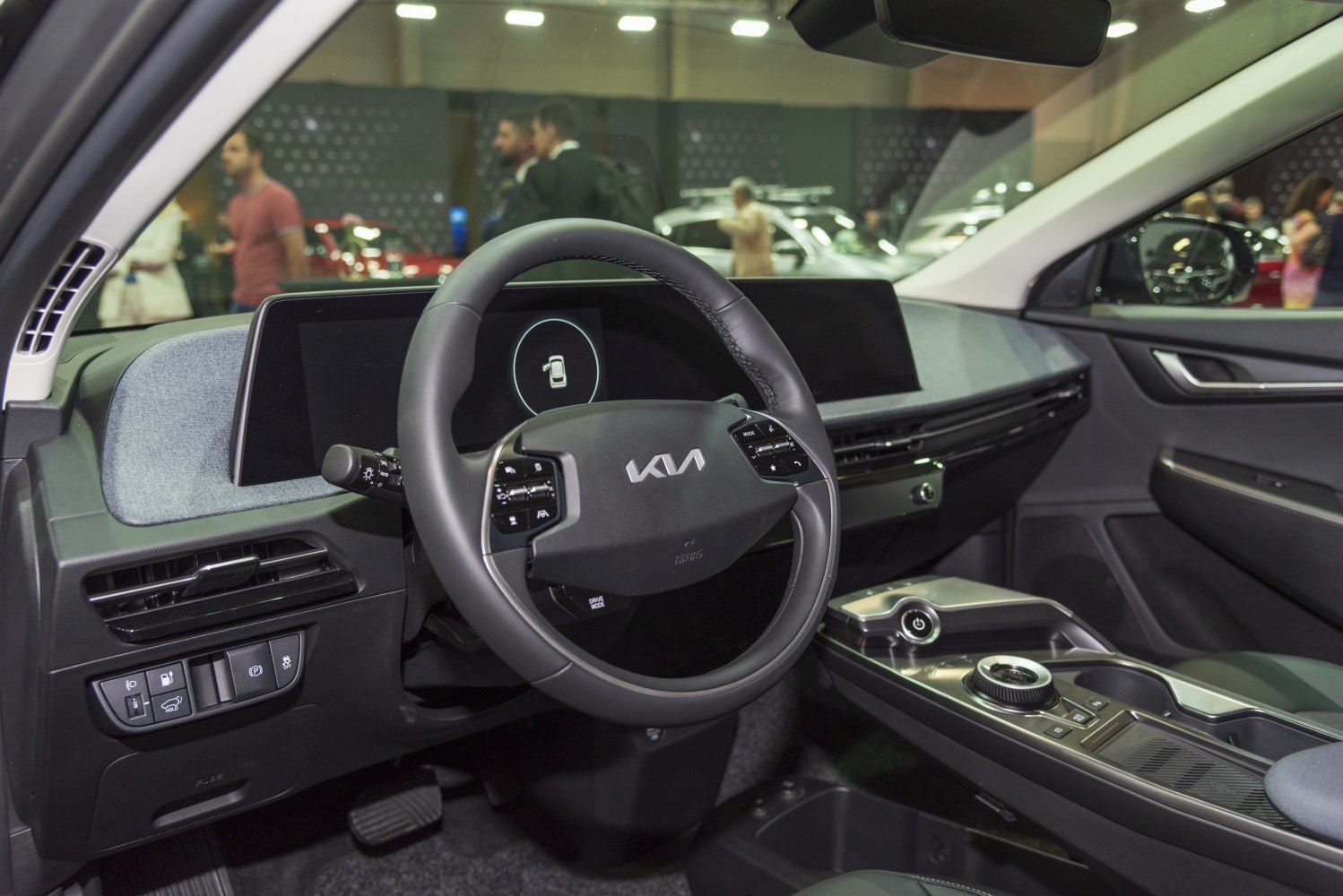 Sleek steering wheel with minimalist digital dashboard and center console controls