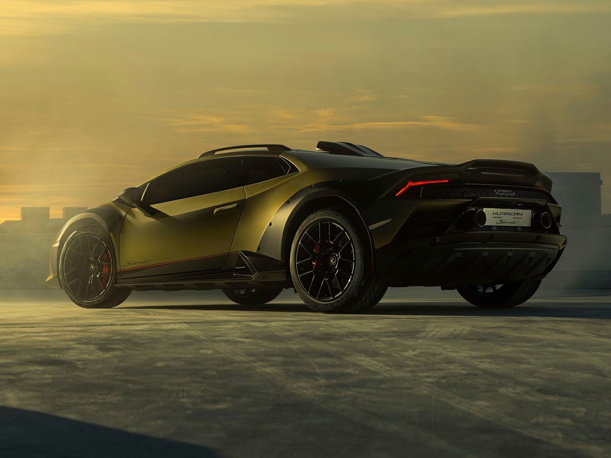 Rear and side profile with off-road tires and sporty rear diffuser