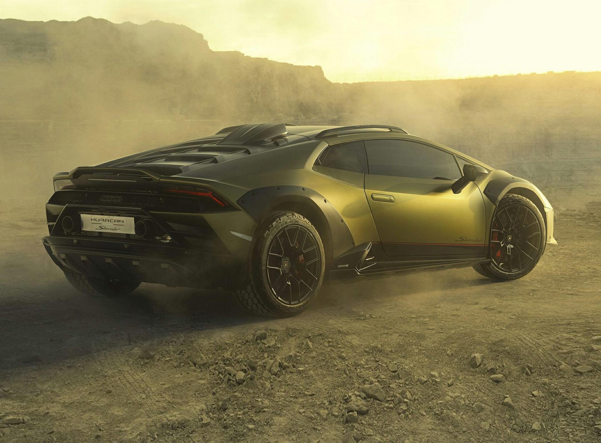 Aggressive off-road tires and aerodynamic features on sporty coupe