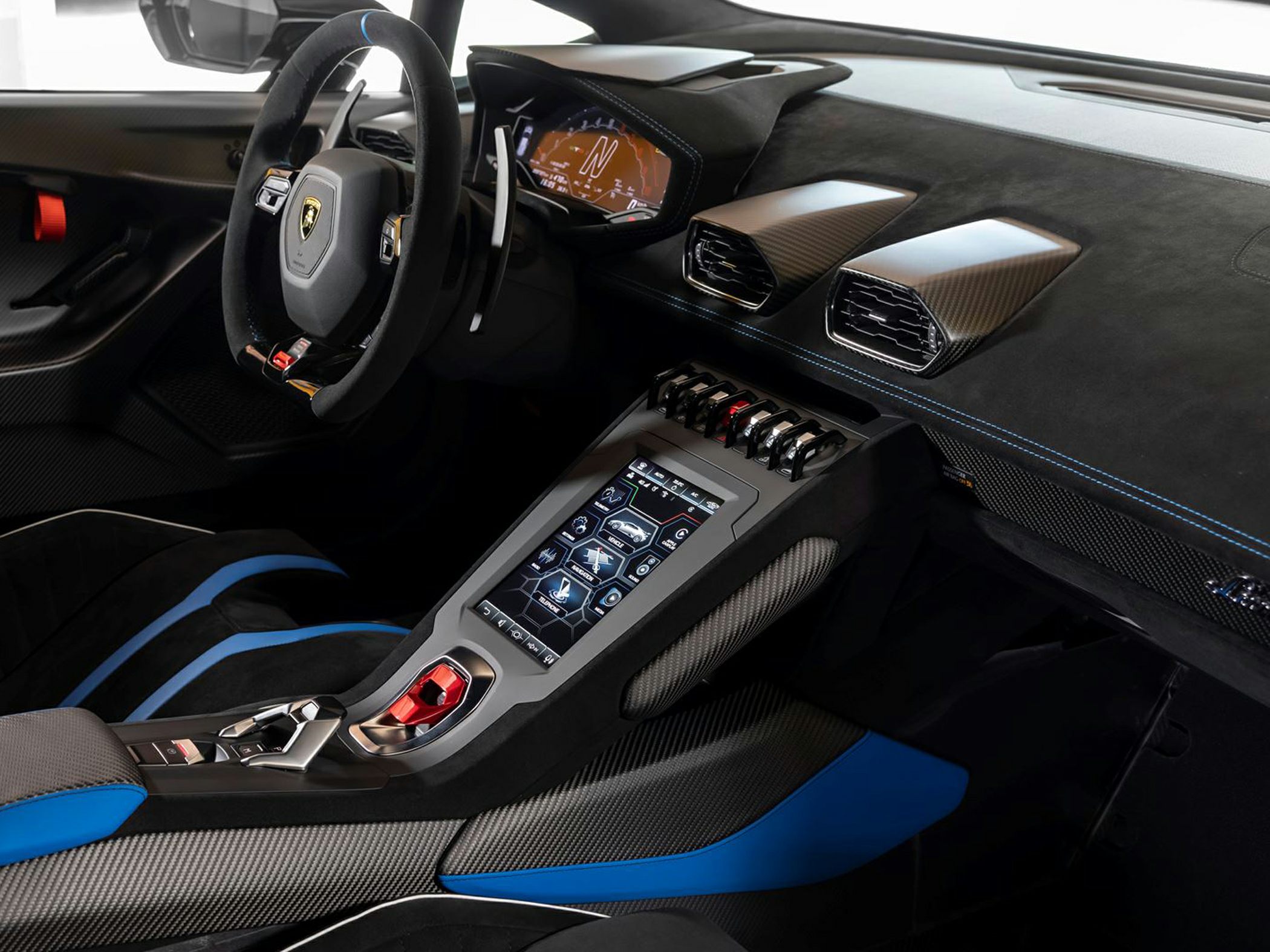 Digital instrument cluster and carbon fiber cockpit with touchscreen controls