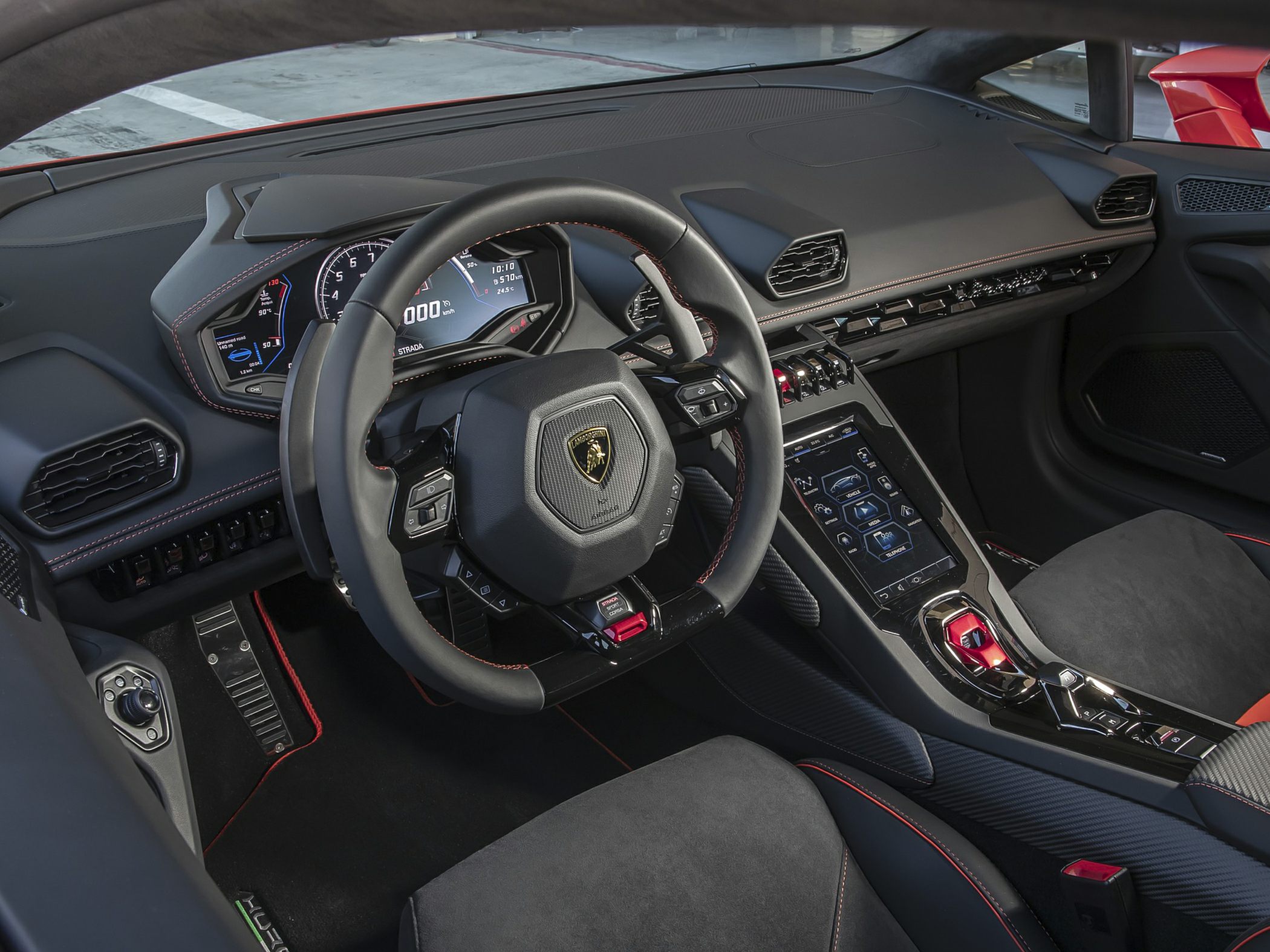 Digital dashboard and sporty steering wheel of modern car interior