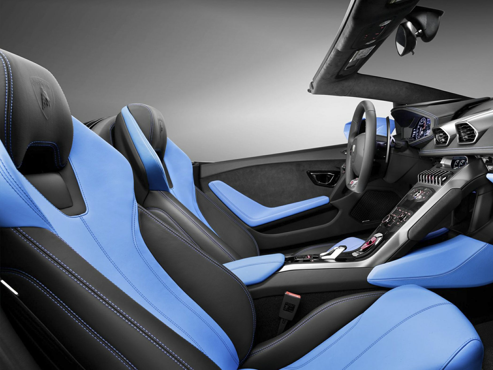 Blue and black leather sporty seats with advanced dashboard