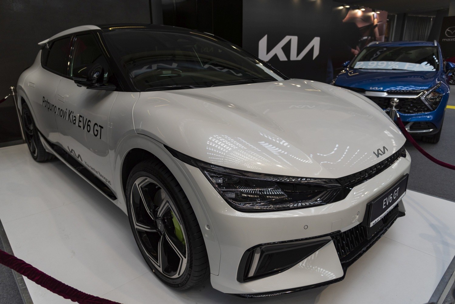 Front-side view of EV with LED headlights and sporty wheels