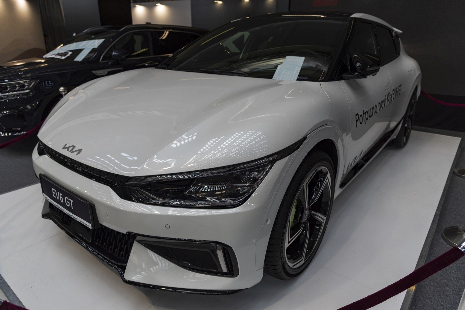 Sharp LED headlights and sporty front bumper of electric vehicle