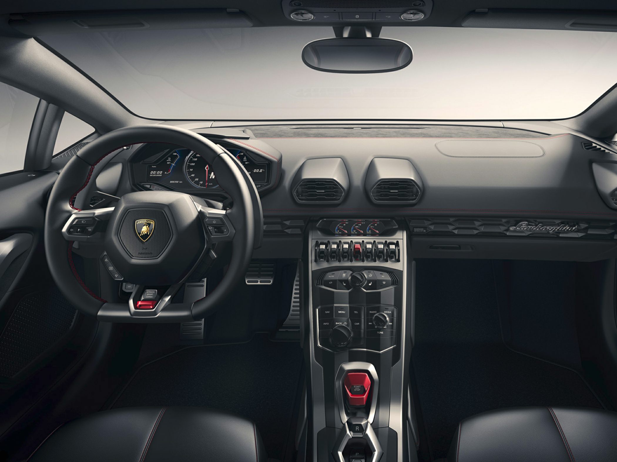Luxury sports car interior with high-tech dashboard and steering wheel.