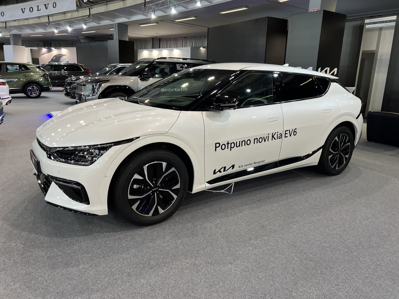 Sleek electric crossover with aerodynamic silhouette and advanced LED headlights.