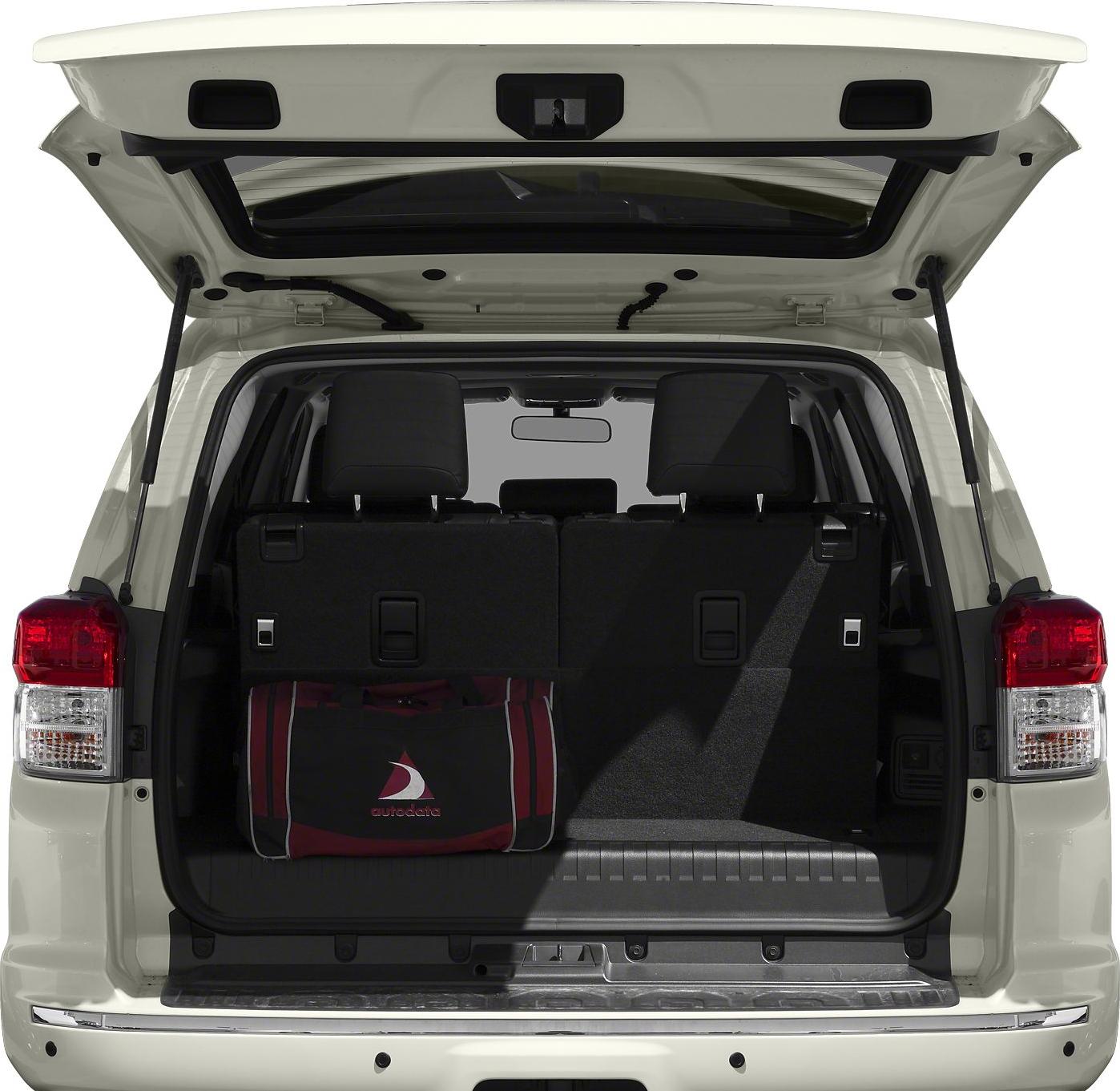 Open rear cargo space with foldable seats and tailgate