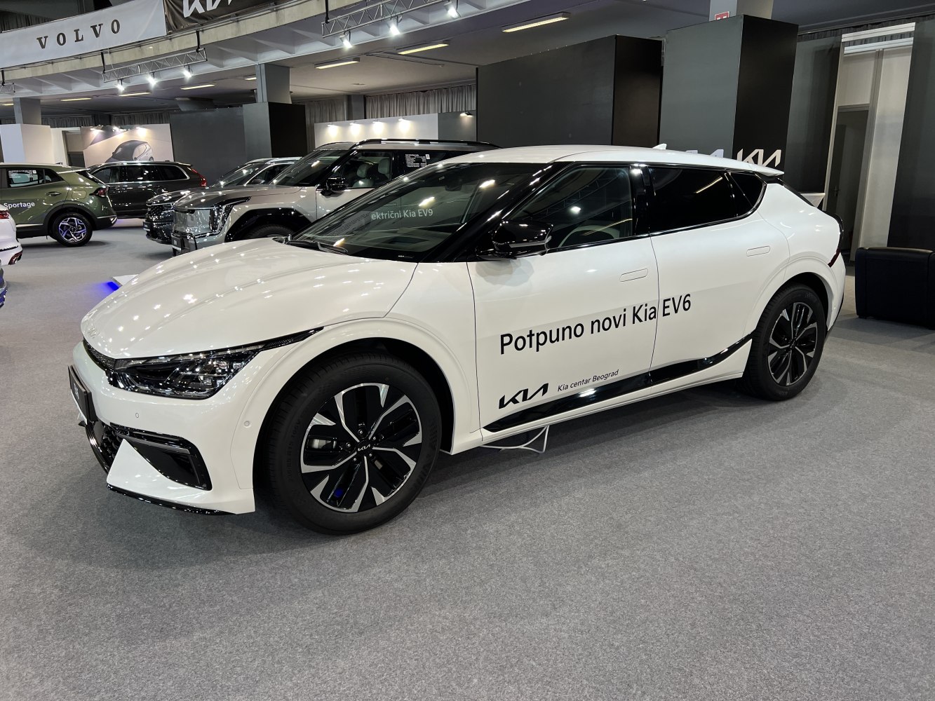 Electric vehicle with LED headlights and alloy wheels