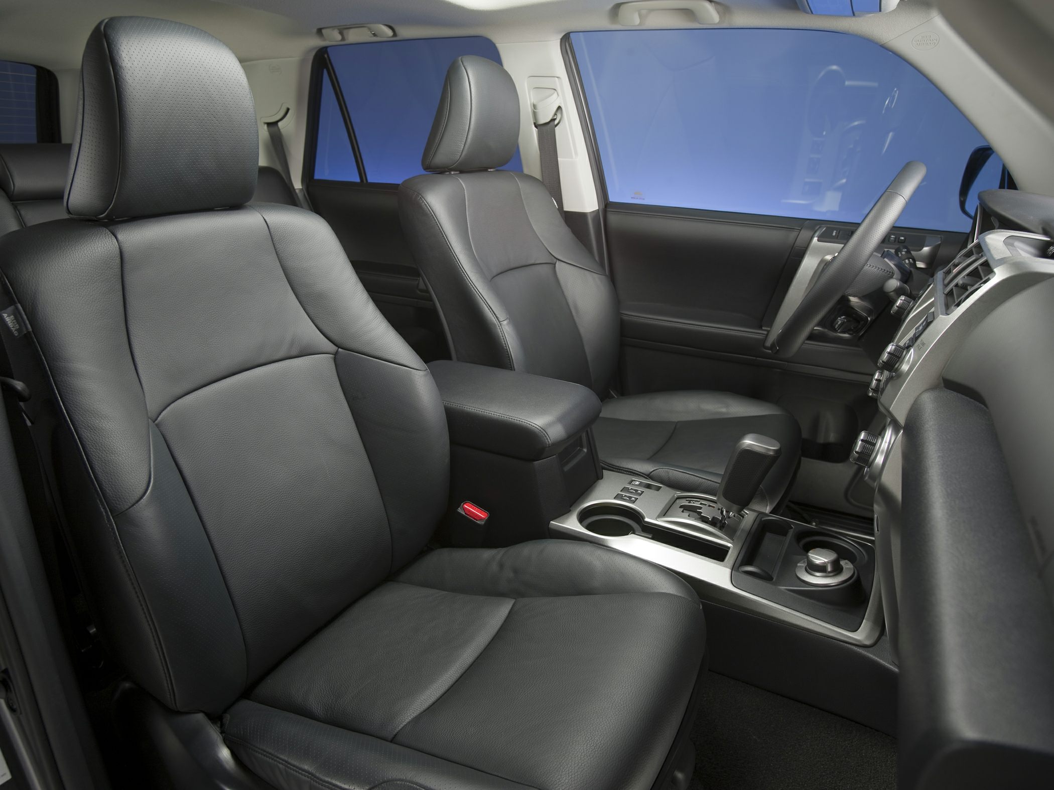 Black leather seats and center console with gear shift