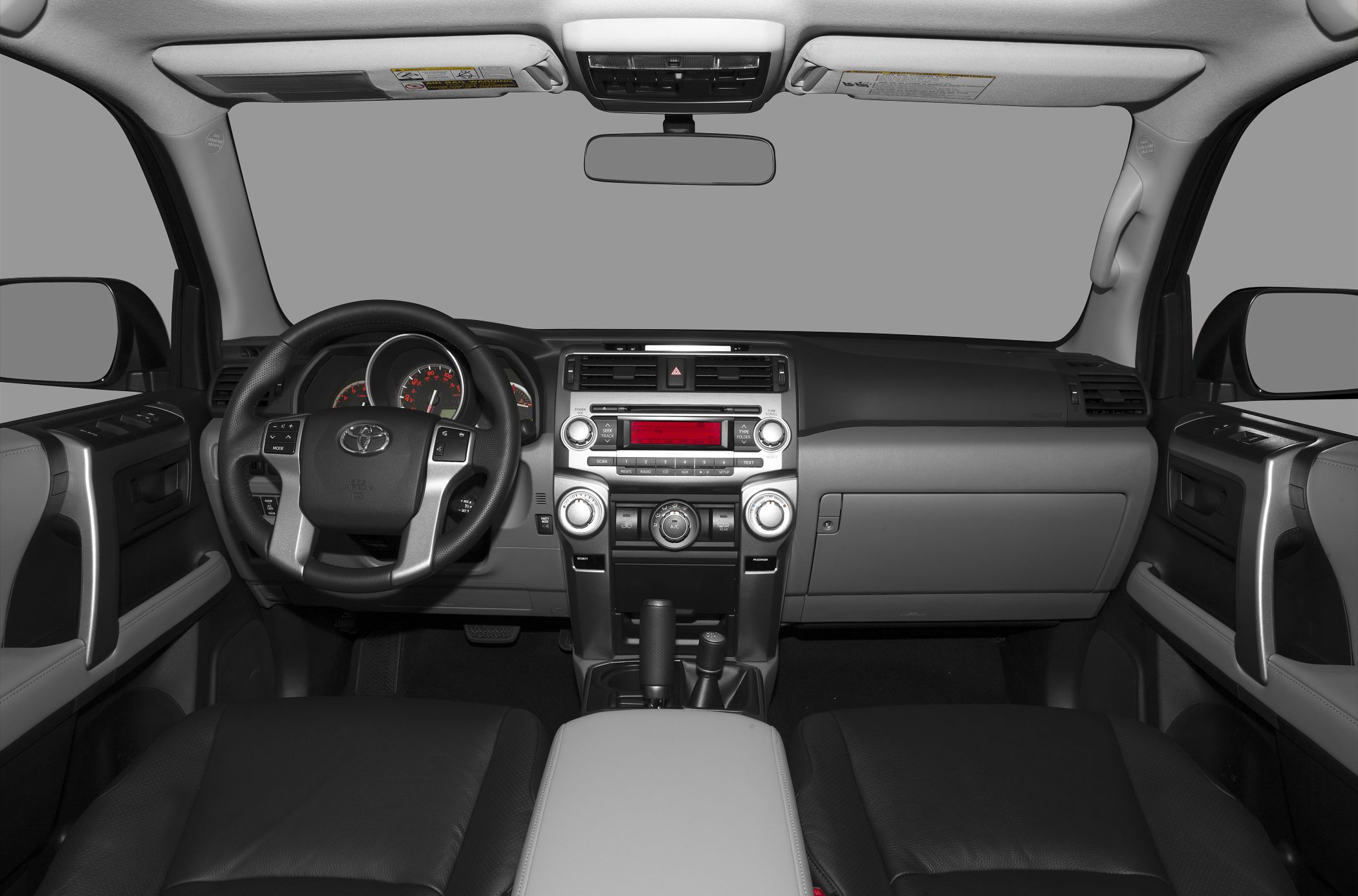 Dashboard and steering wheel with control panel and front seats