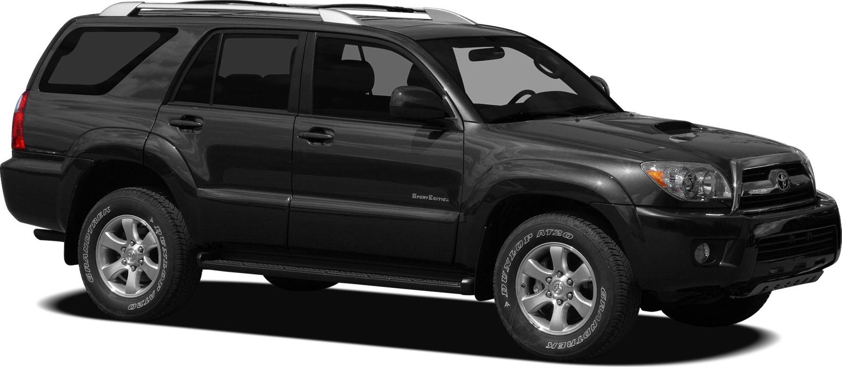 Mid-size SUV with off-road styling, hood scoop, roof rails, and all-terrain tires