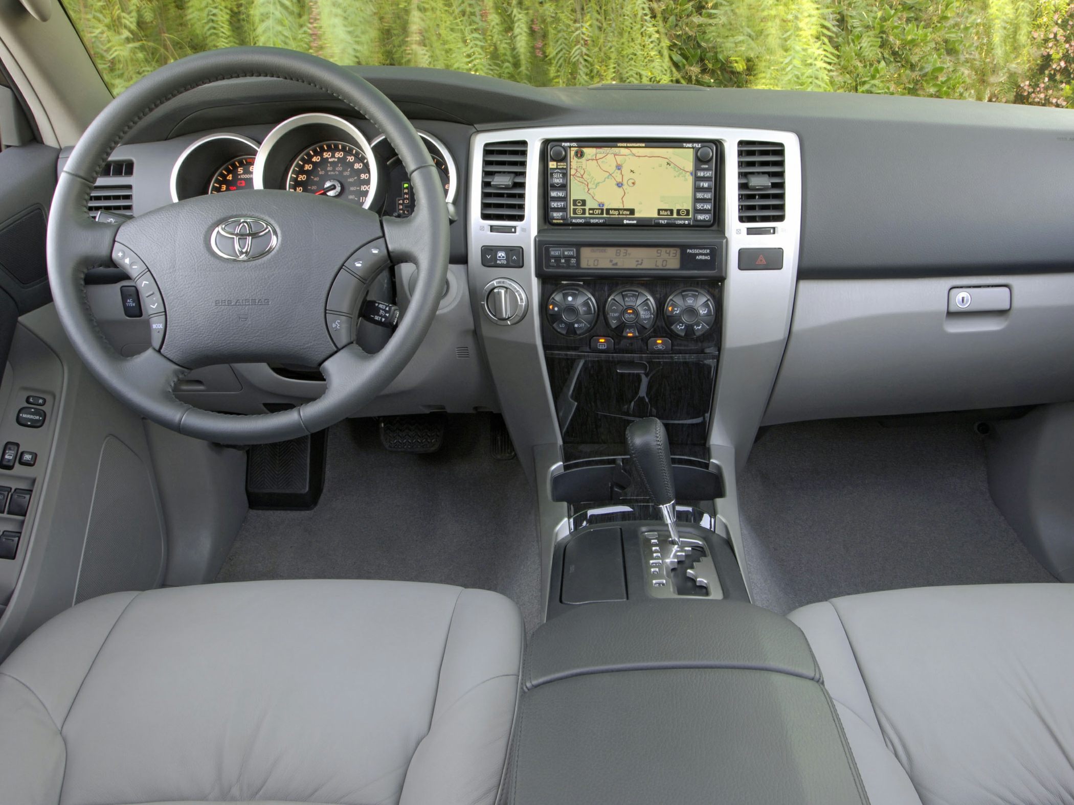 Dashboard, steering wheel, center console with navigation and climate controls