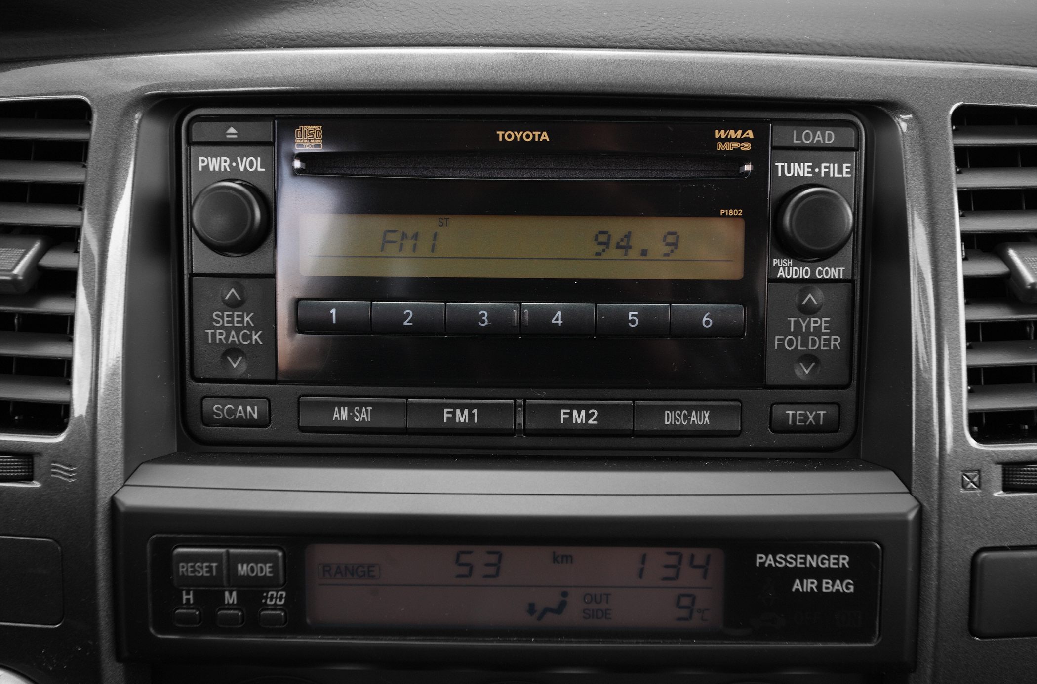 Factory stereo dashboard with audio controls and display